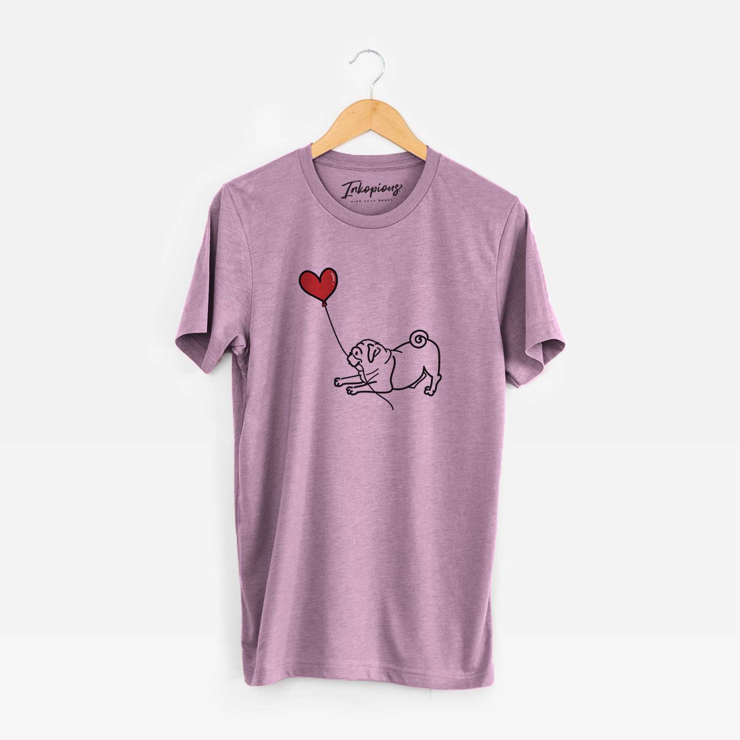 Minimalist line drawing of a Pug Heart String holding a heart balloon on an Orchid Unisex crewneck
