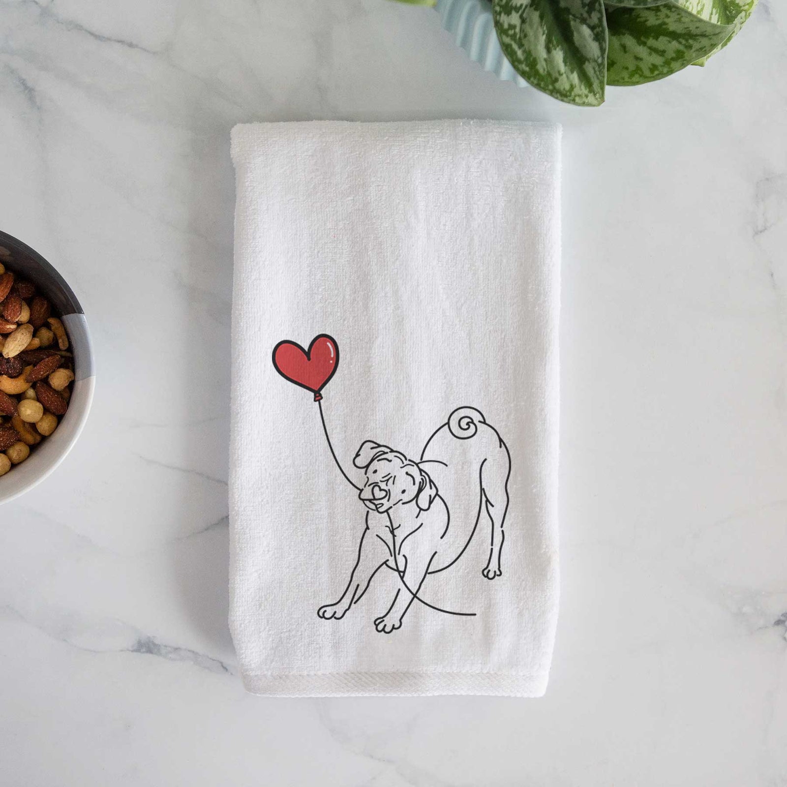 Minimalist line drawing of a Puggle Heart String holding a heart balloon on a decorative hand towel