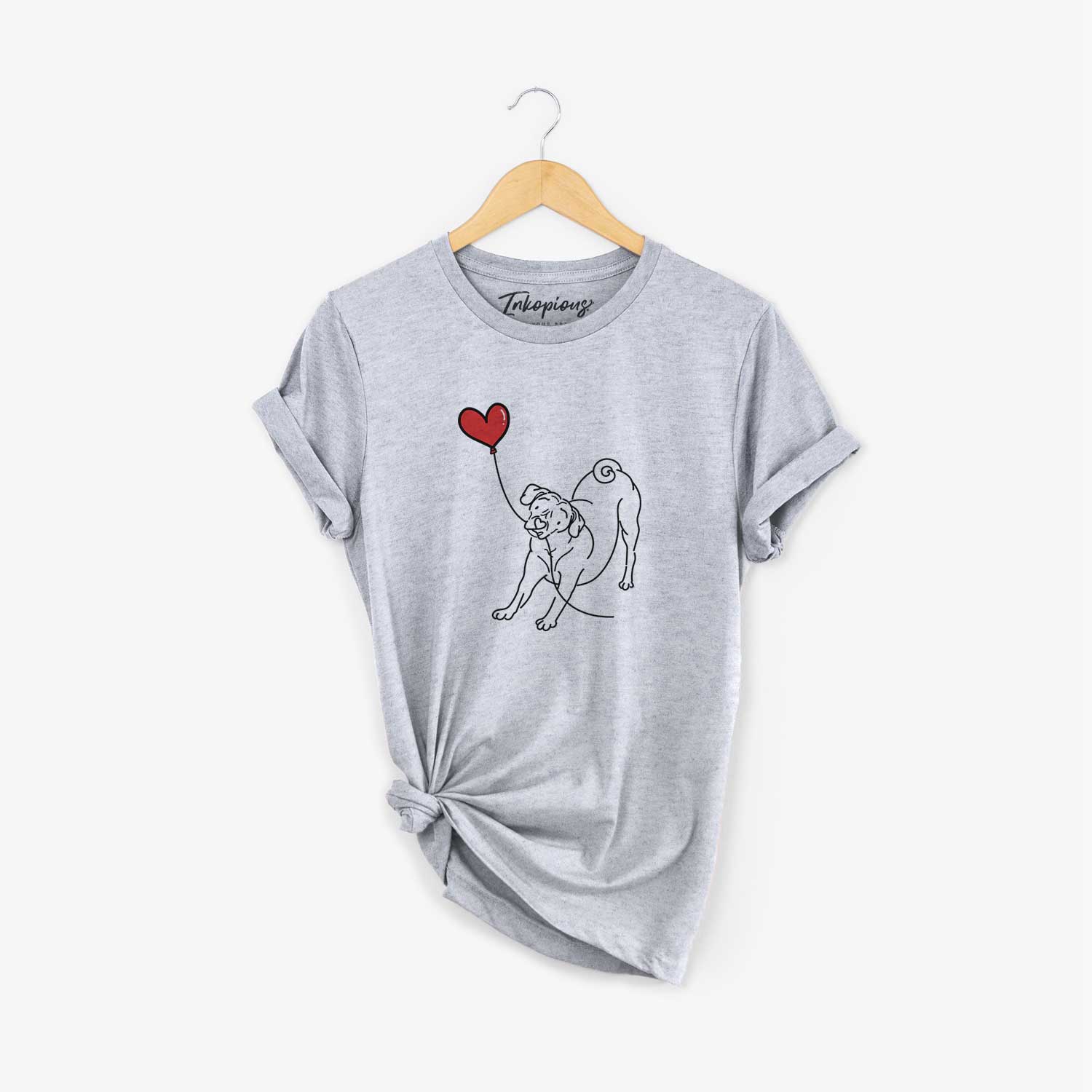 Minimalist line drawing of a Puggle Heart String holding a heart balloon on a Grey Unisex crewneck
