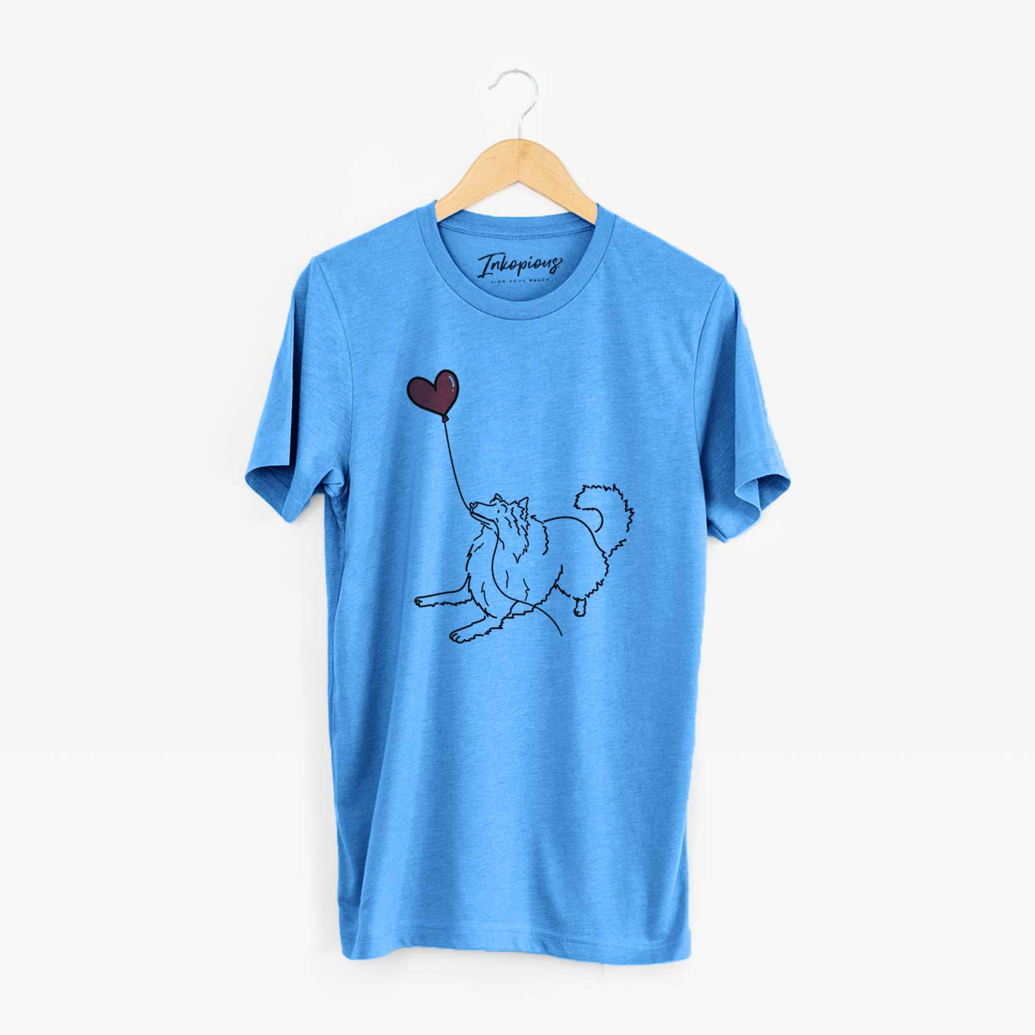 Minimalist line drawing of a Rough Collie Heart String holding a heart balloon on a Blue Unisex crewneck