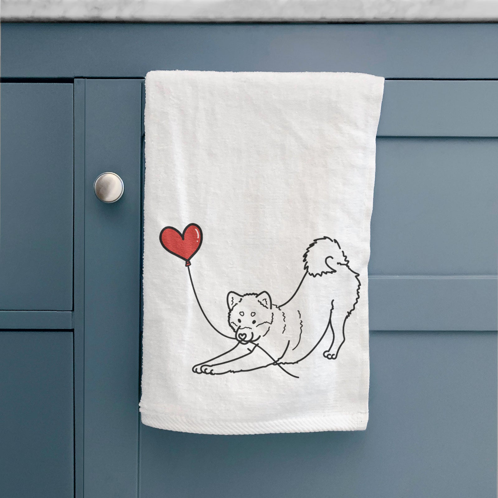 Minimalist line drawing of a Shiba Inu Heart String holding a heart balloon on a decorative hand towel
