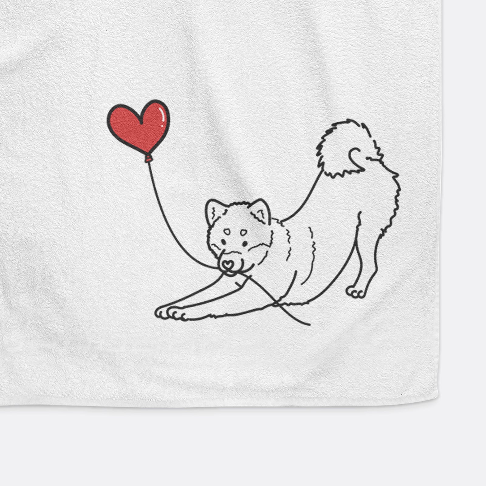 Minimalist line drawing of a Shiba Inu Heart String holding a heart balloon on a decorative hand towel