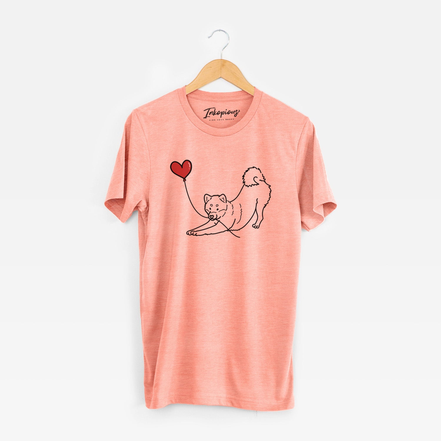Minimalist line drawing of a Shiba Inu Heart String holding a heart balloon on a Sunset Unisex crewneck