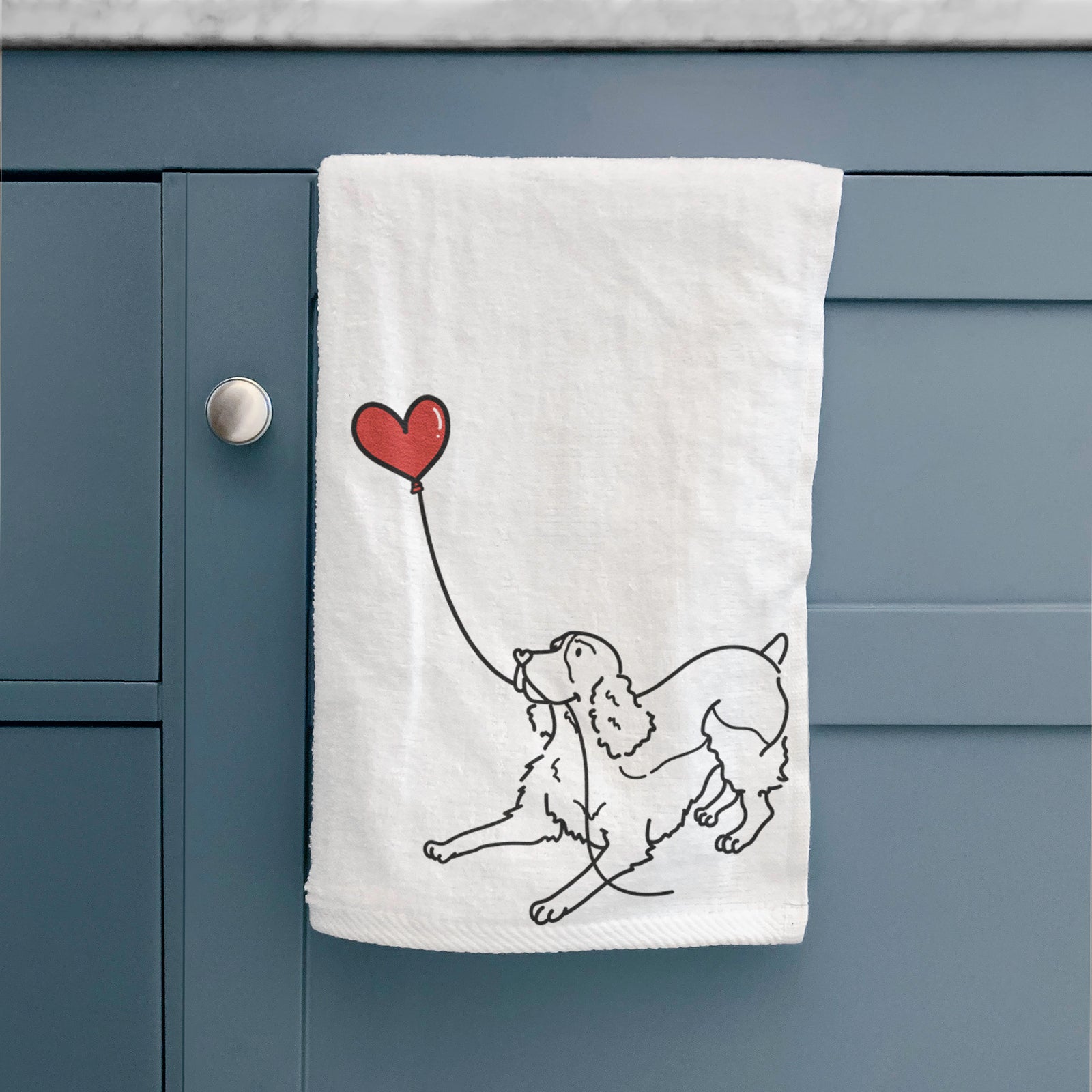 Minimalist line drawing of an English Springer Spaniel Heart String holding a heart balloon on a decorative hand towel