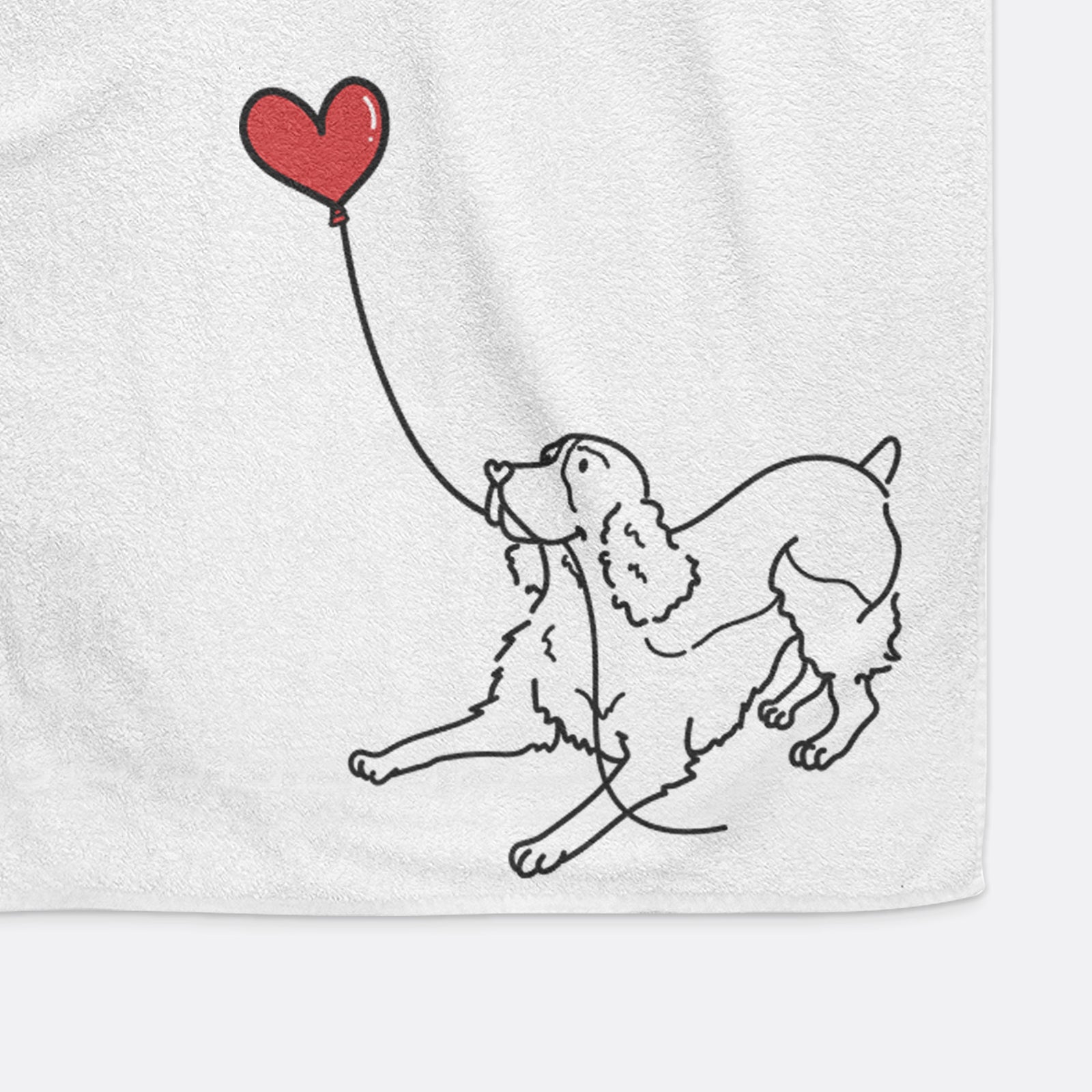 Minimalist line drawing of an English Springer Spaniel Heart String holding a heart balloon on a decorative hand towel