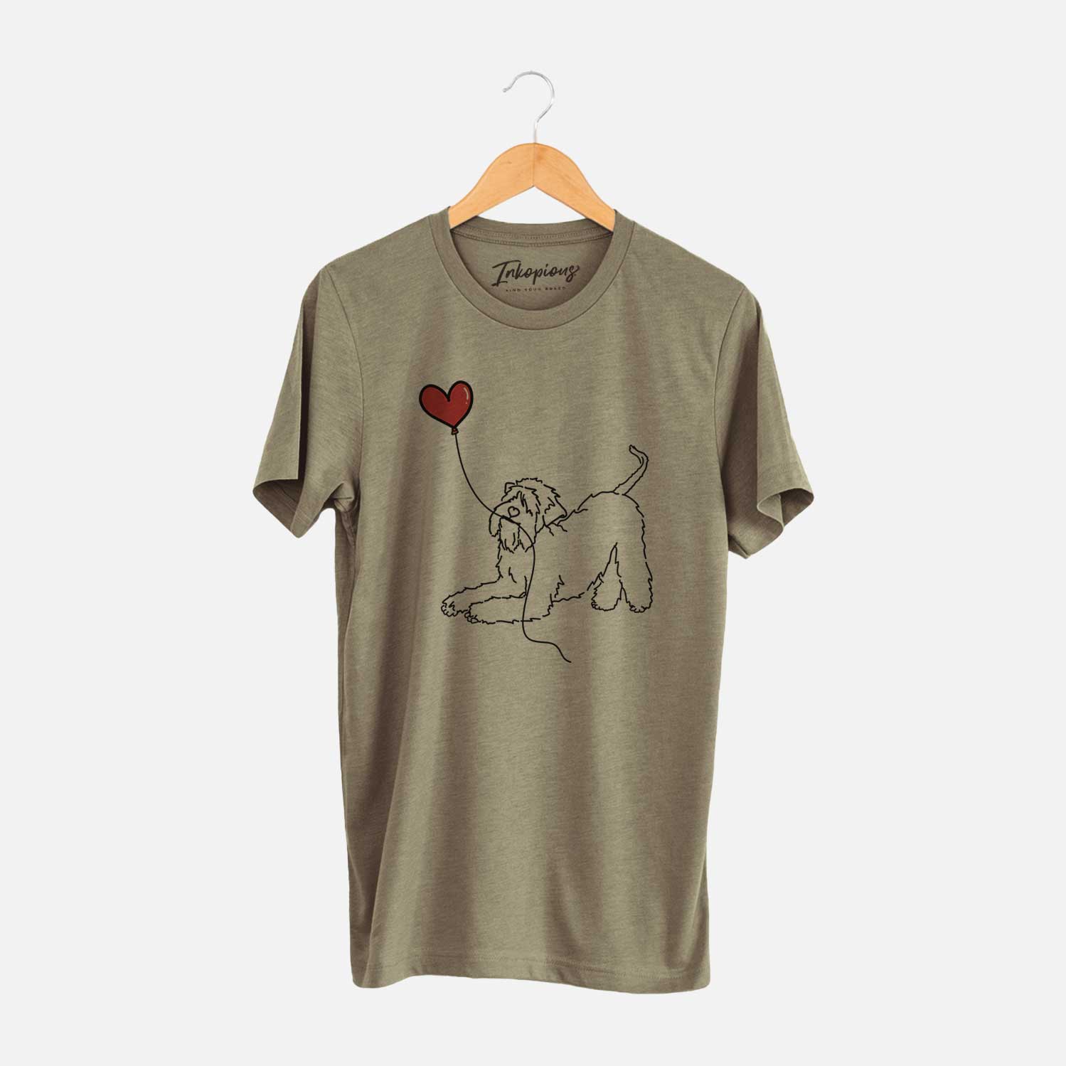 Minimalist line drawing of a Soft-Coated Wheaten Terrier Heart String holding a heart balloon on an Olive Unisex crewneck