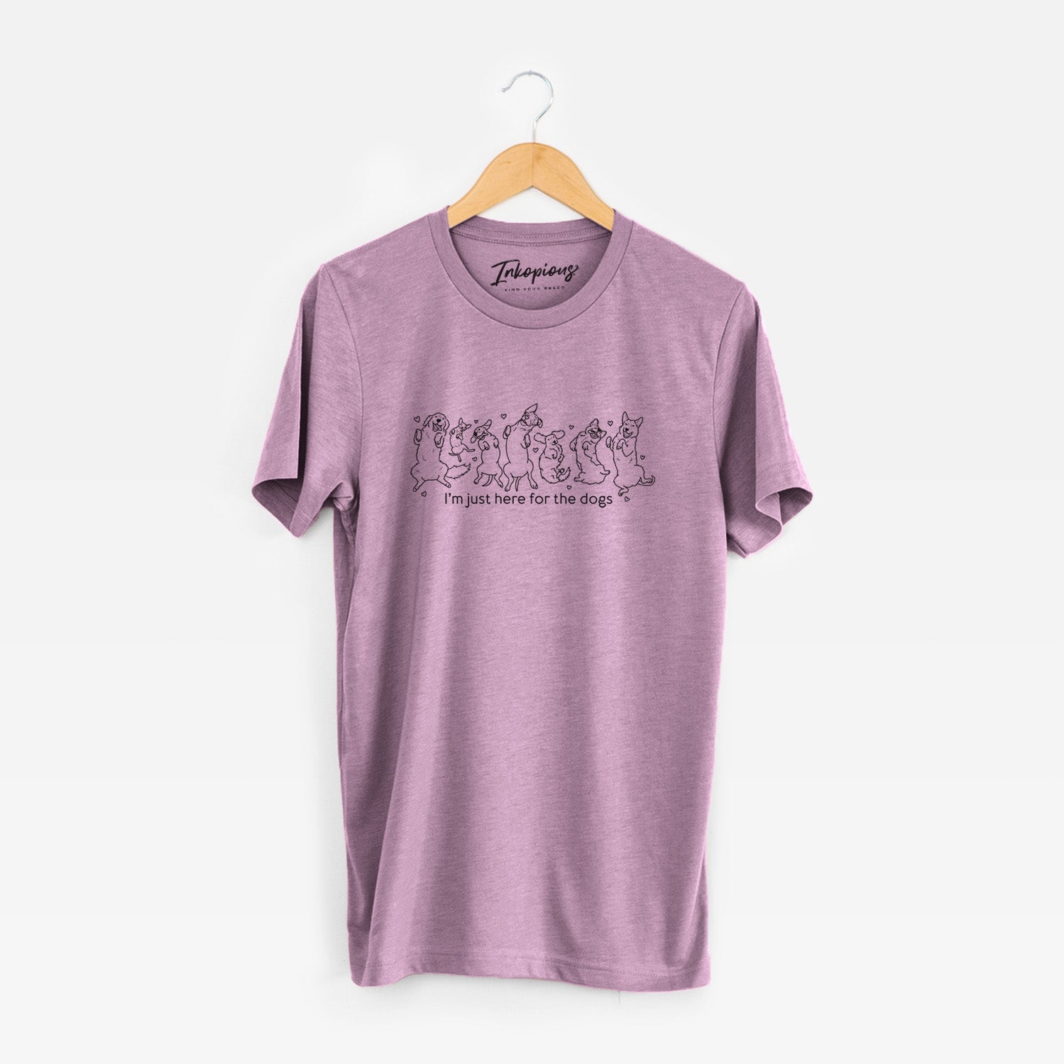 'I'm Just Here for the Dogs' design on an Orchid Unisex crewneck