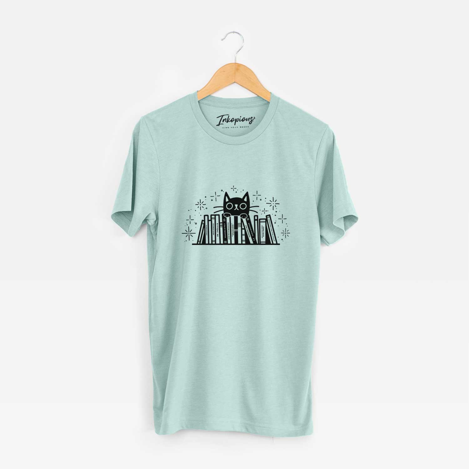 'Kitty Library - Black Cat Behind Books' design on a Heather Sage Unisex crewneck
