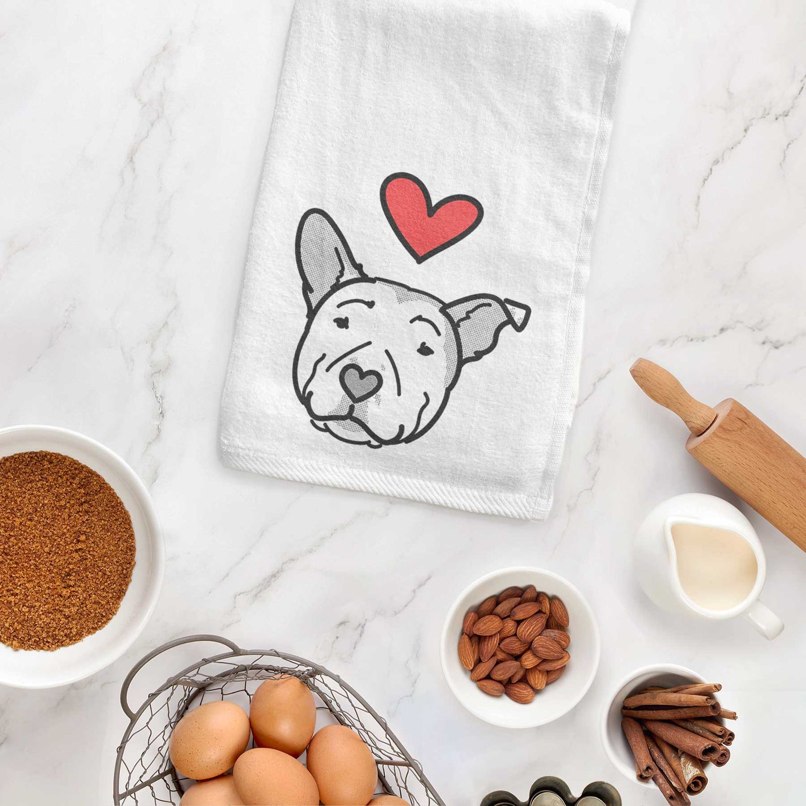 Minimalist line drawing of Archer the Pitbull with a red heart on a decorative hand towel