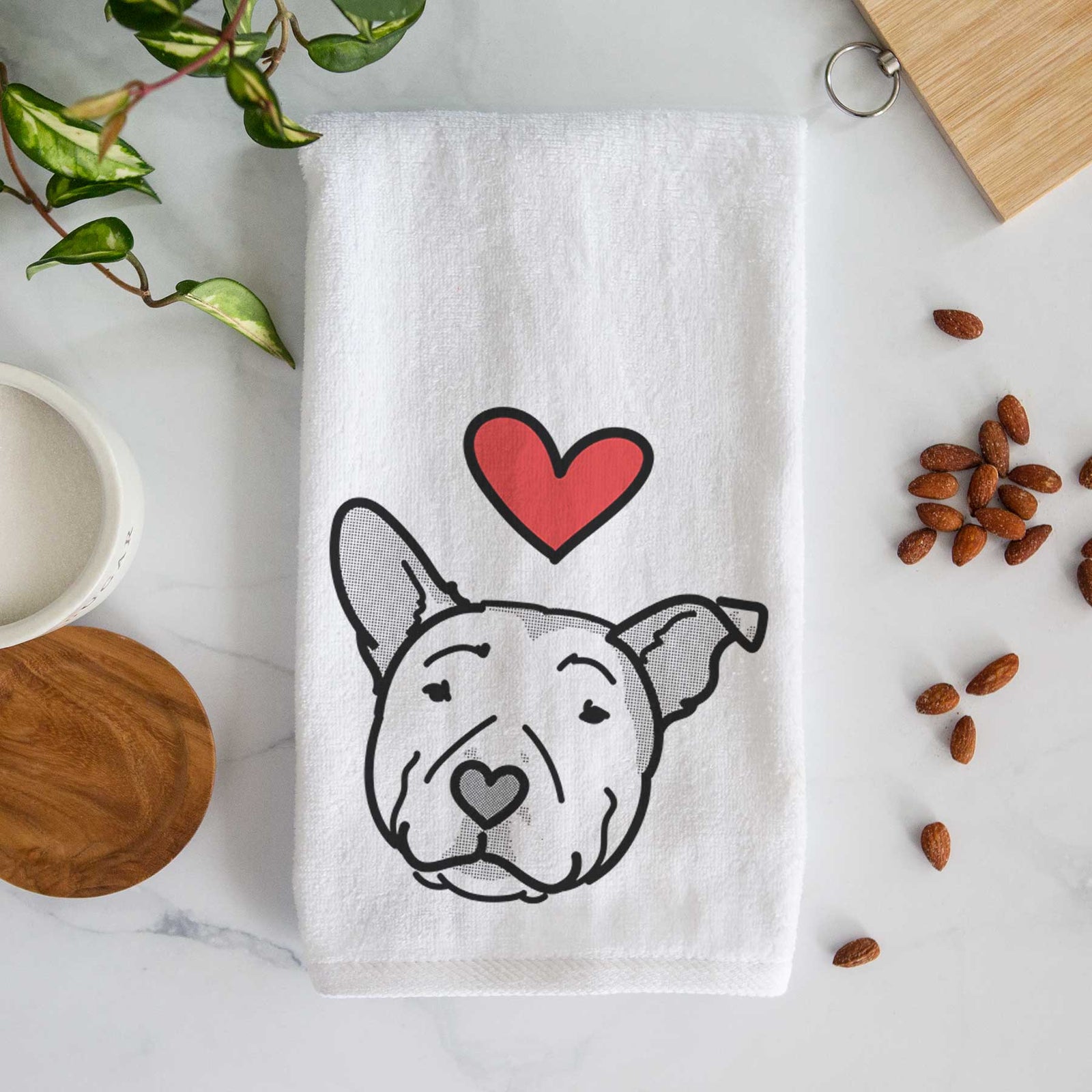 Minimalist line drawing of Archer the Pitbull with a red heart on a decorative hand towel