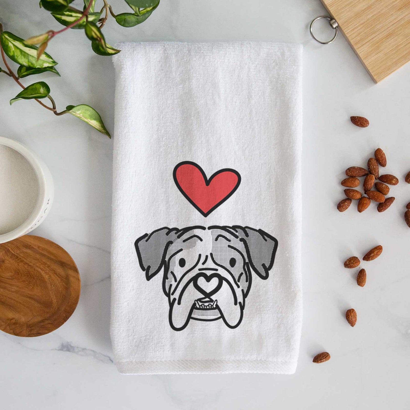 Minimalist line drawing of Bailey the English Bulldog with a red heart on a decorative hand towel