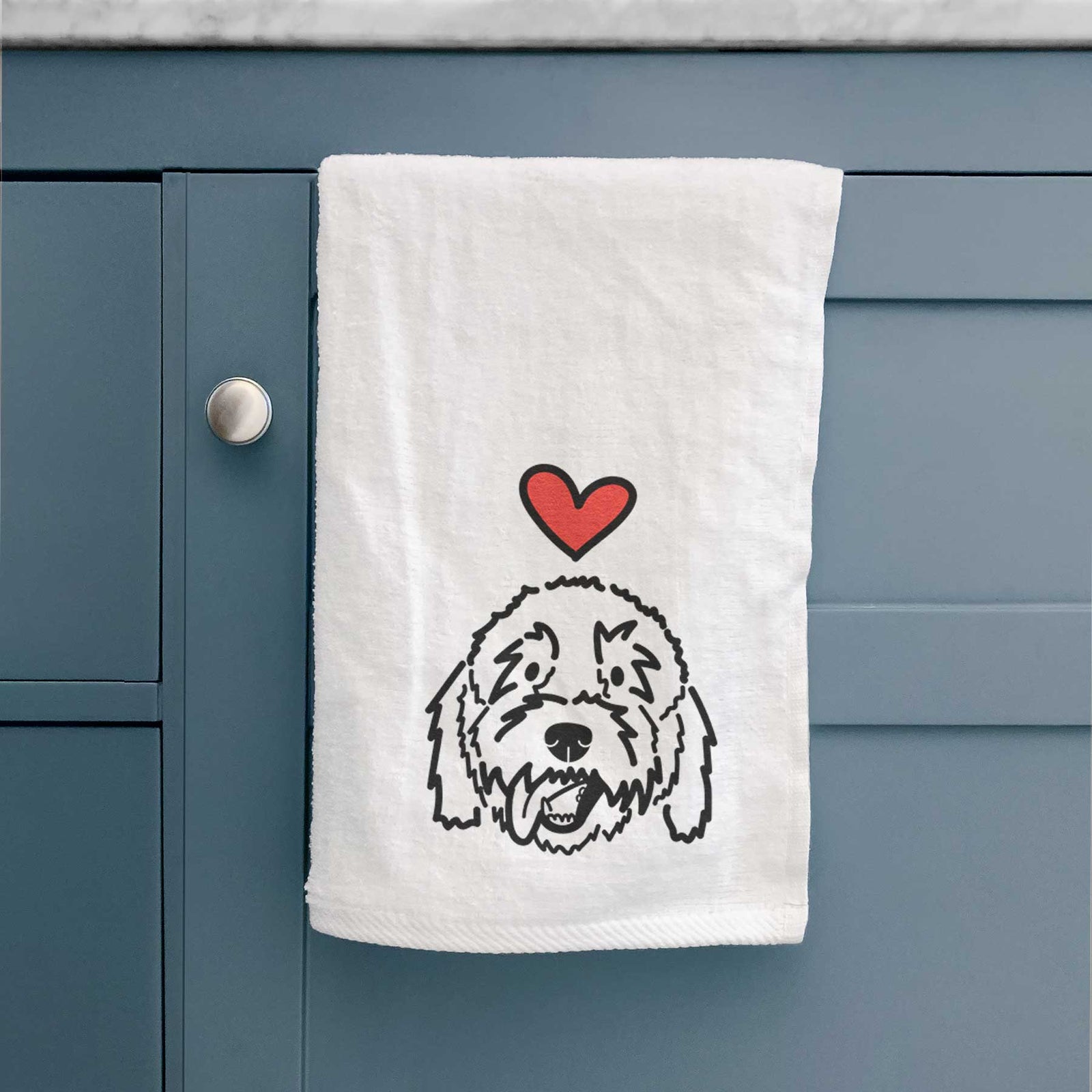 Minimalist line drawing of Barry the Goldendoodle with a red heart on a decorative hand towel