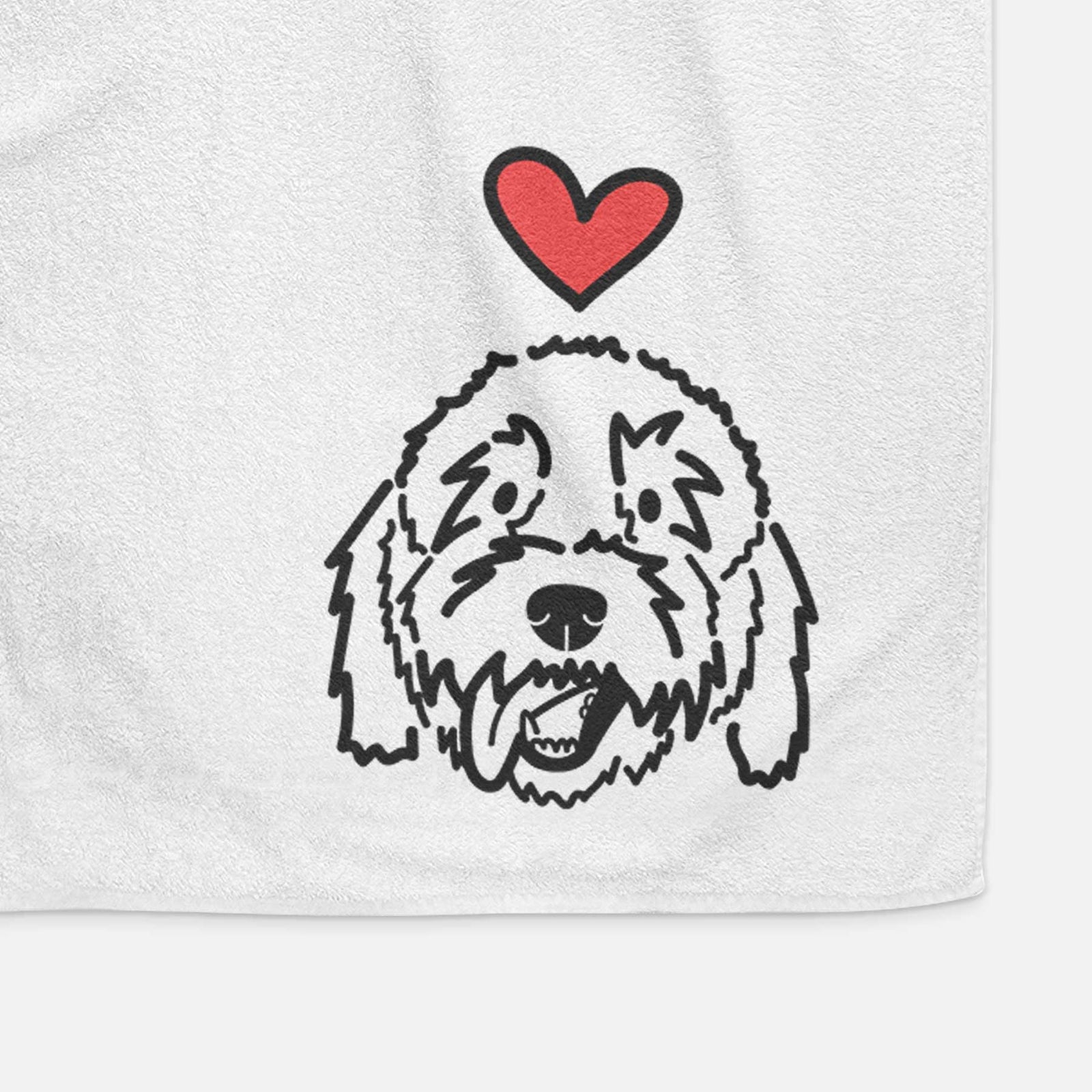 Minimalist line drawing of Barry the Goldendoodle with a red heart on a decorative hand towel