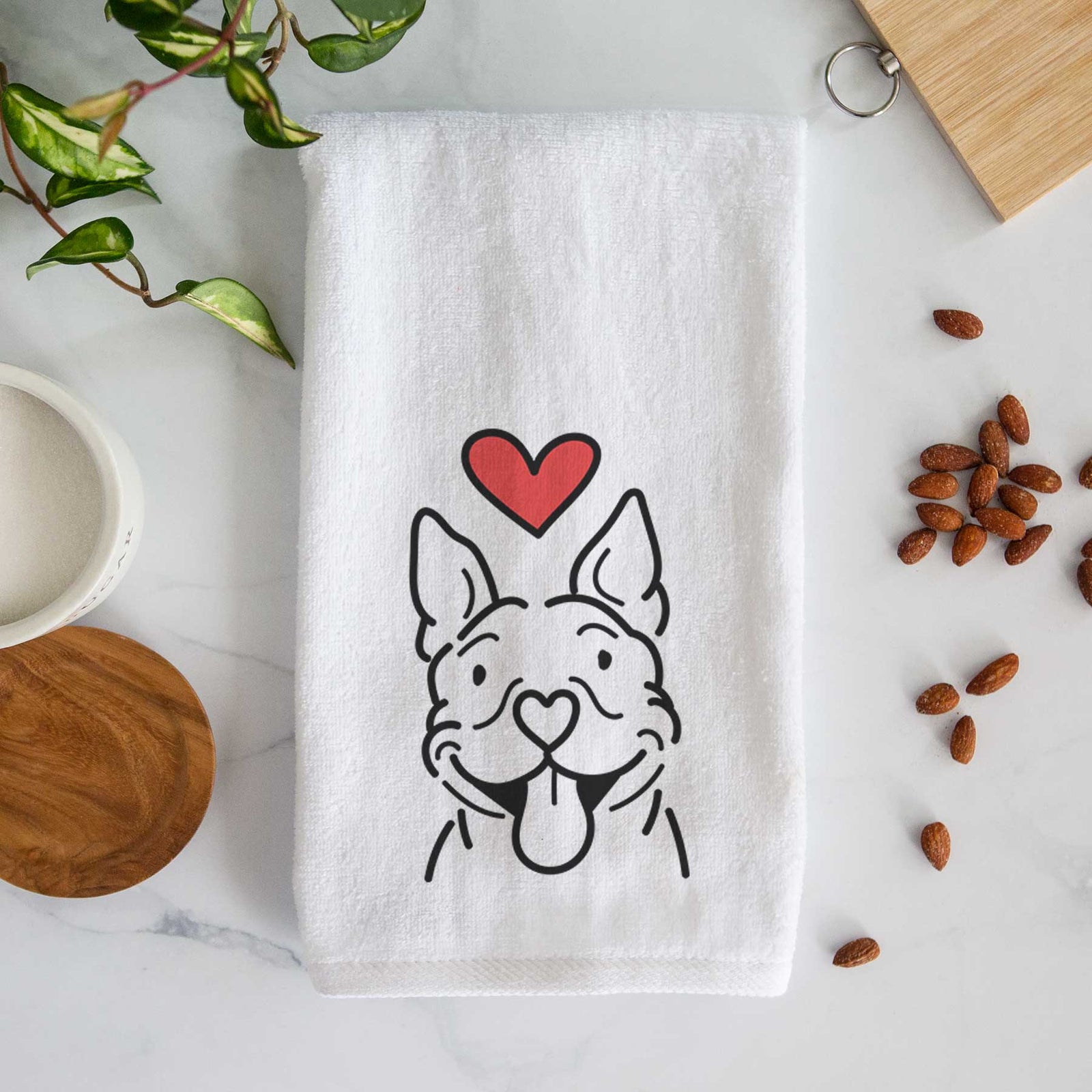 Minimalist line drawing of Basil the Pitbull with a red heart on a decorative hand towel
