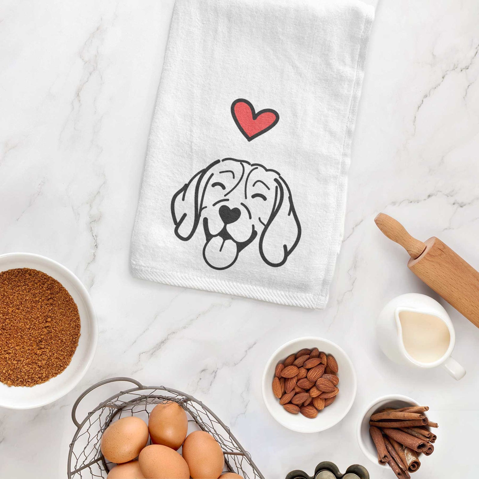 Minimalist line drawing of a Beagle with a red heart on a decorative hand towel