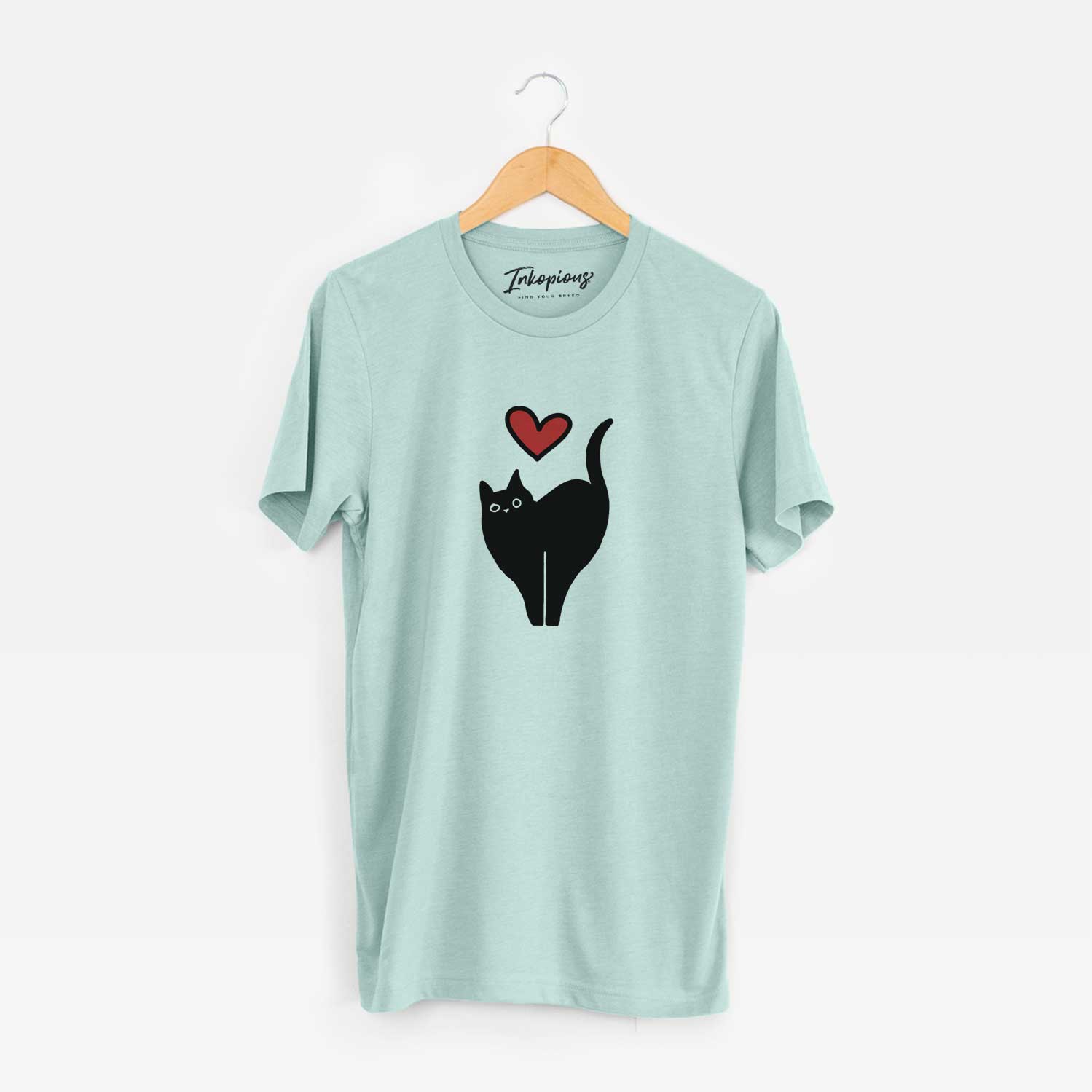 Minimalist line drawing of Bella the Black Cat with a red heart on a Heather Sage Unisex crewneck