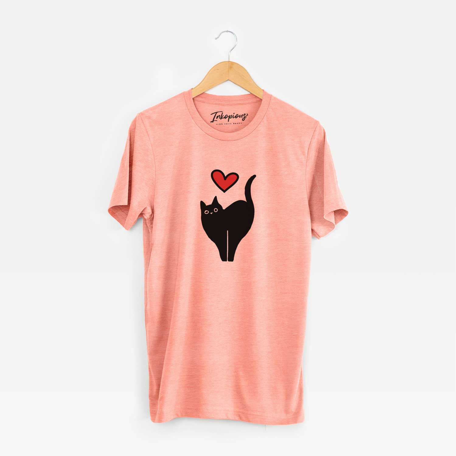 Minimalist line drawing of Bella the Black Cat with a red heart on a Sunset Unisex crewneck