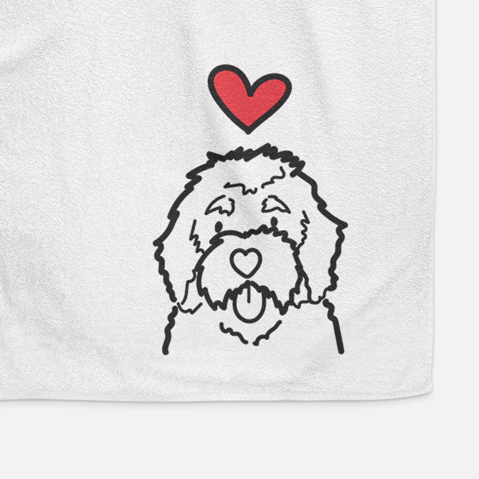 Minimalist line drawing of a Bernedoodle with a red heart on a decorative hand towel