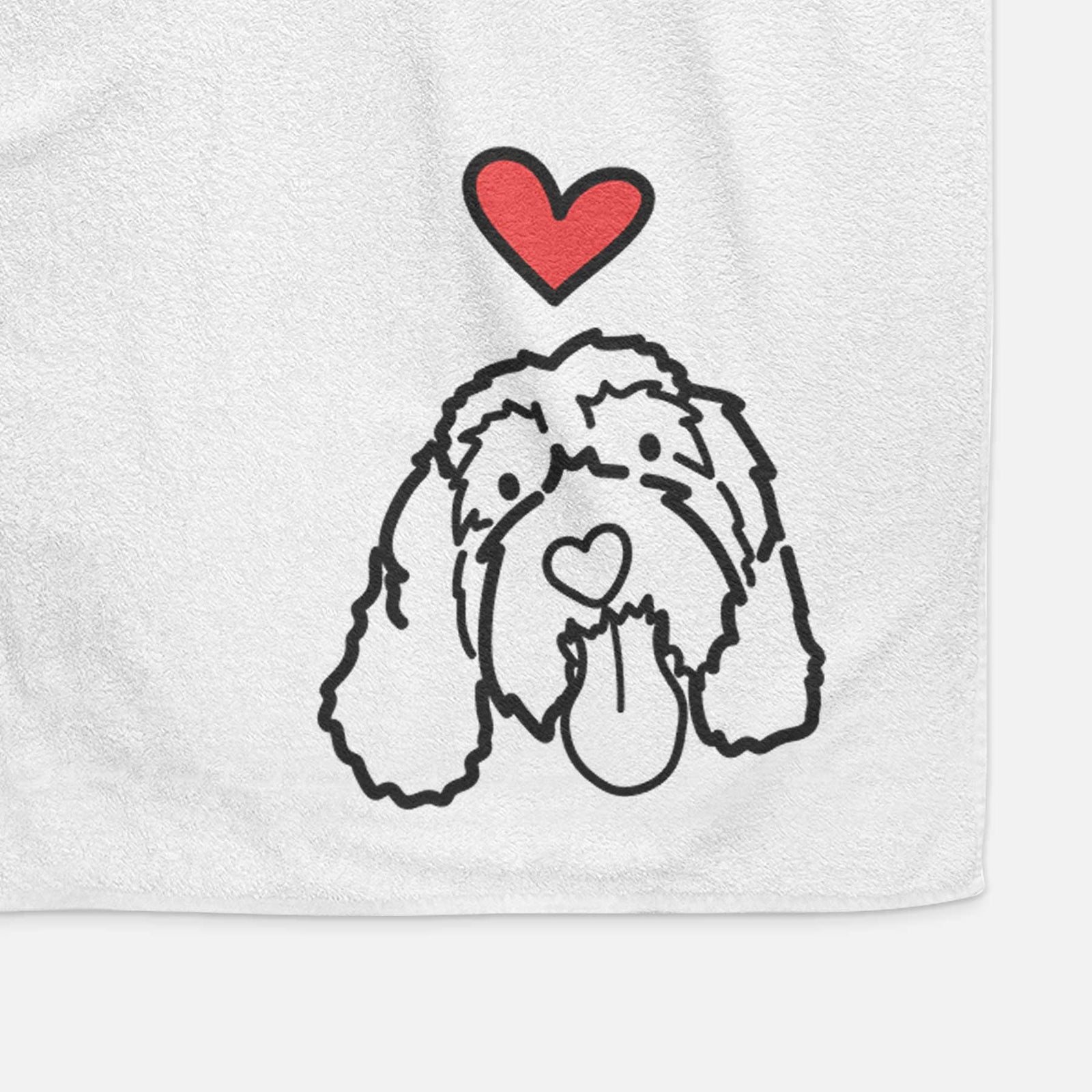 Minimalist line drawing of Bo the Portguese Water Dog with a red heart on a decorative hand towel