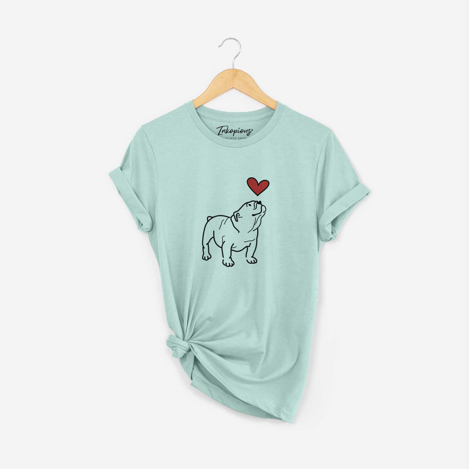 Minimalist line drawing of Bruno the English Bulldog with a red heart on a Heather Sage Unisex crewneck