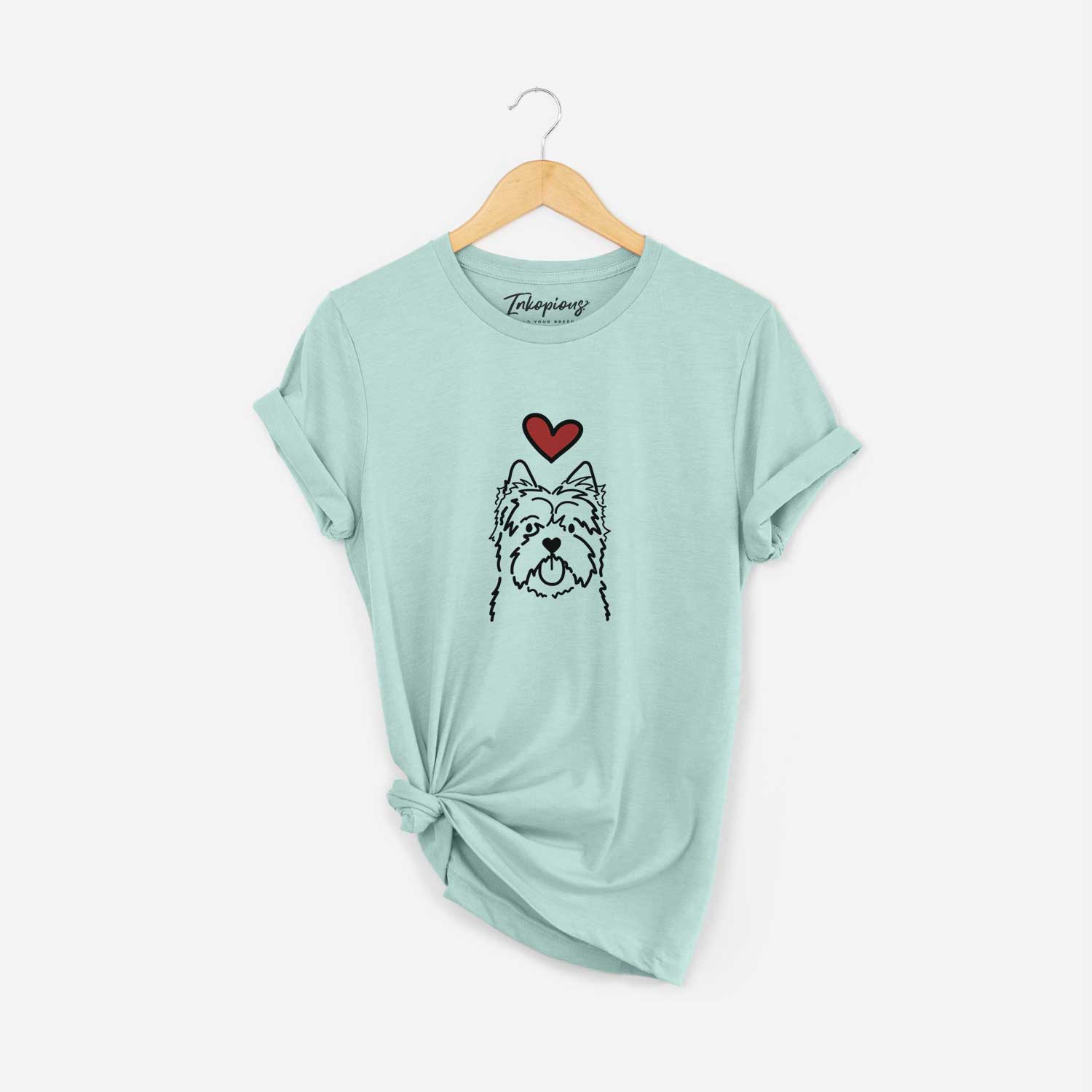 Minimalist line drawing of a Cairn Terrier with a red heart on a Heather Sage Unisex crewneck