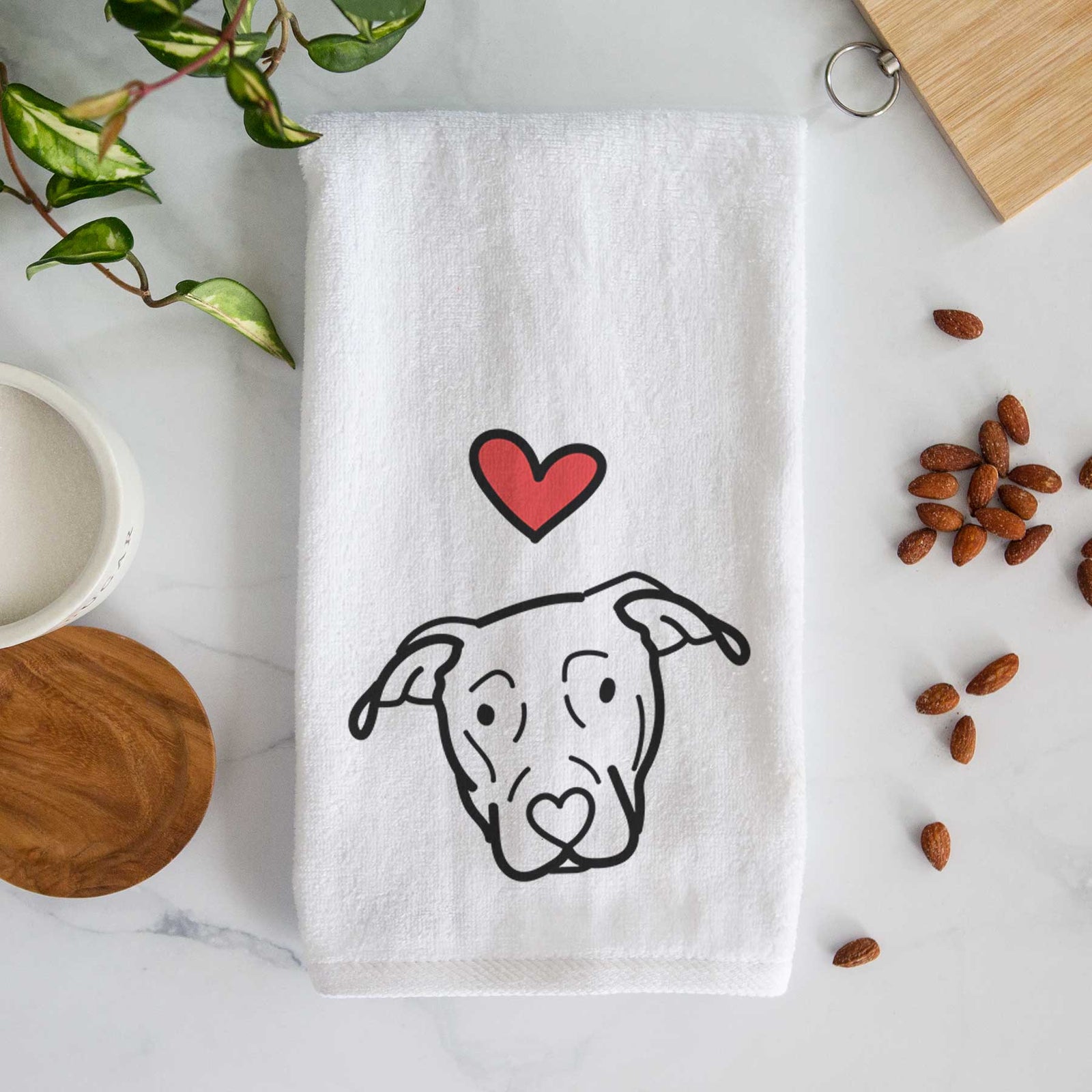 Minimalist line drawing of a Catahoula with a red heart on a decorative hand towel