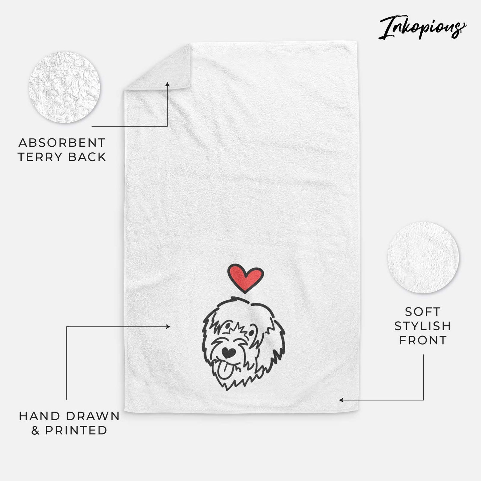 Minimalist line drawing of a Catalan Sheepdog with a red heart on a decorative hand towel