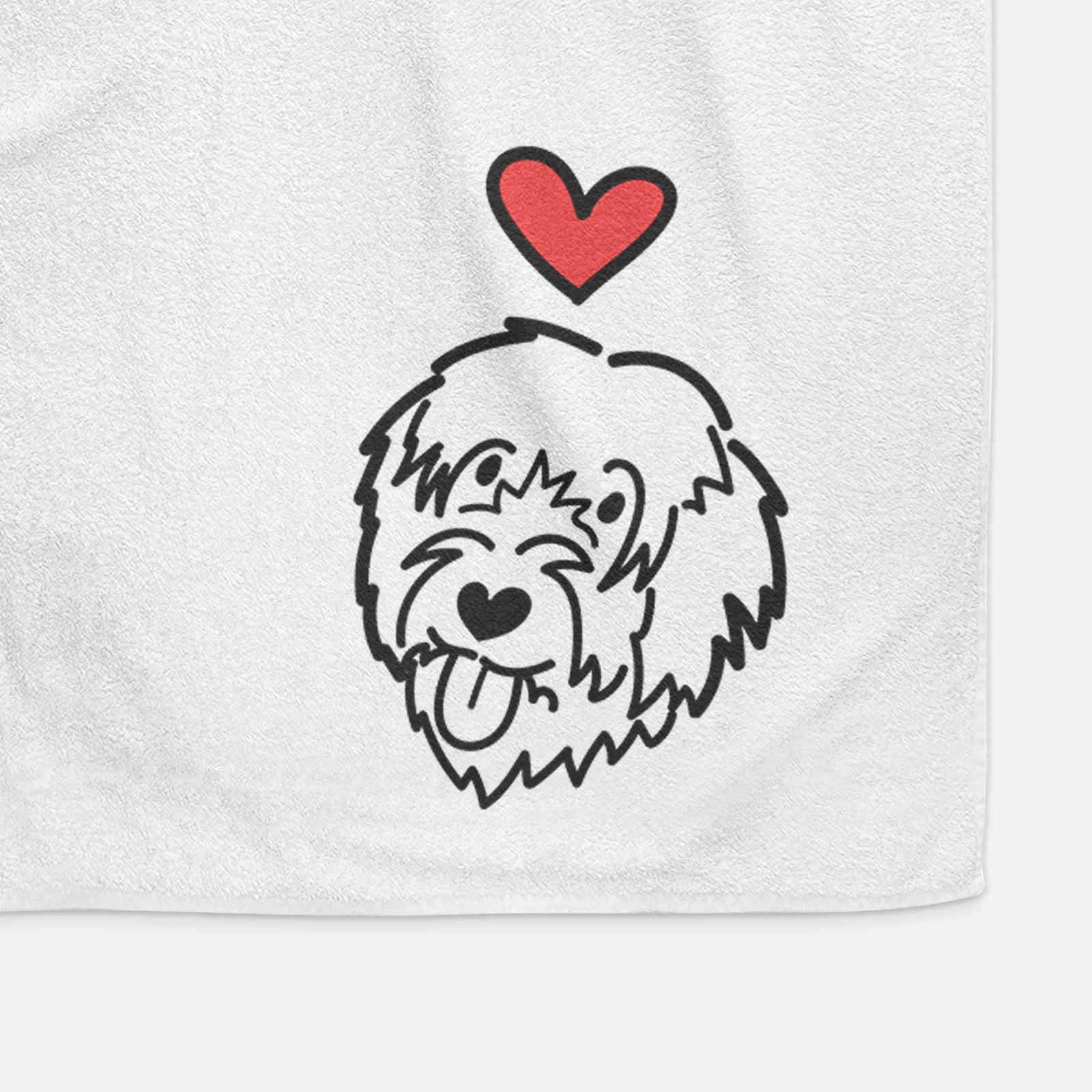 Minimalist line drawing of a Catalan Sheepdog with a red heart on a decorative hand towel