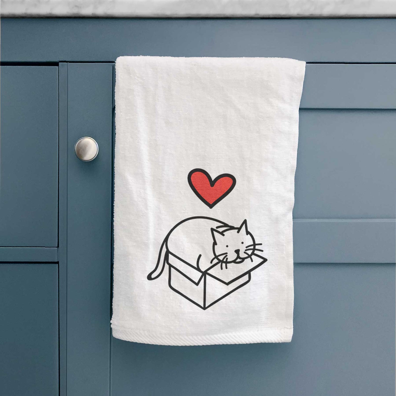 Minimalist line drawing of Charlie the Cat in a Box with a red heart on a decorative hand towel