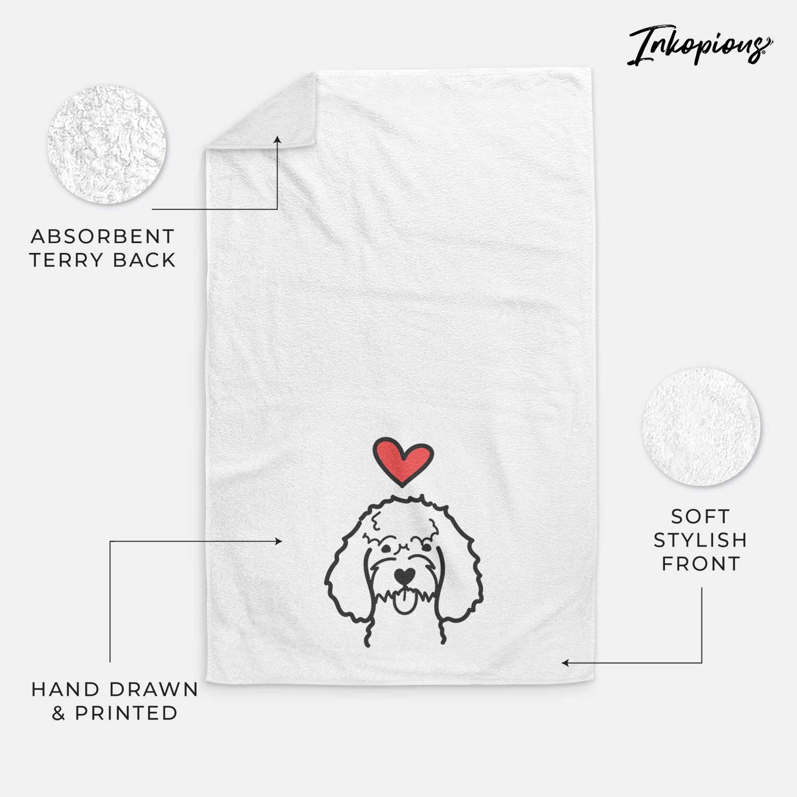 Minimalist line drawing of a Cockapoo with a red heart on a decorative hand towel