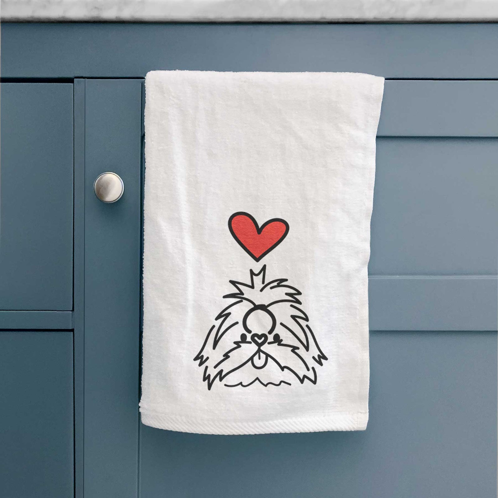 Minimalist line drawing of CoCo the Shih Tzu with a red heart on a decorative hand towel