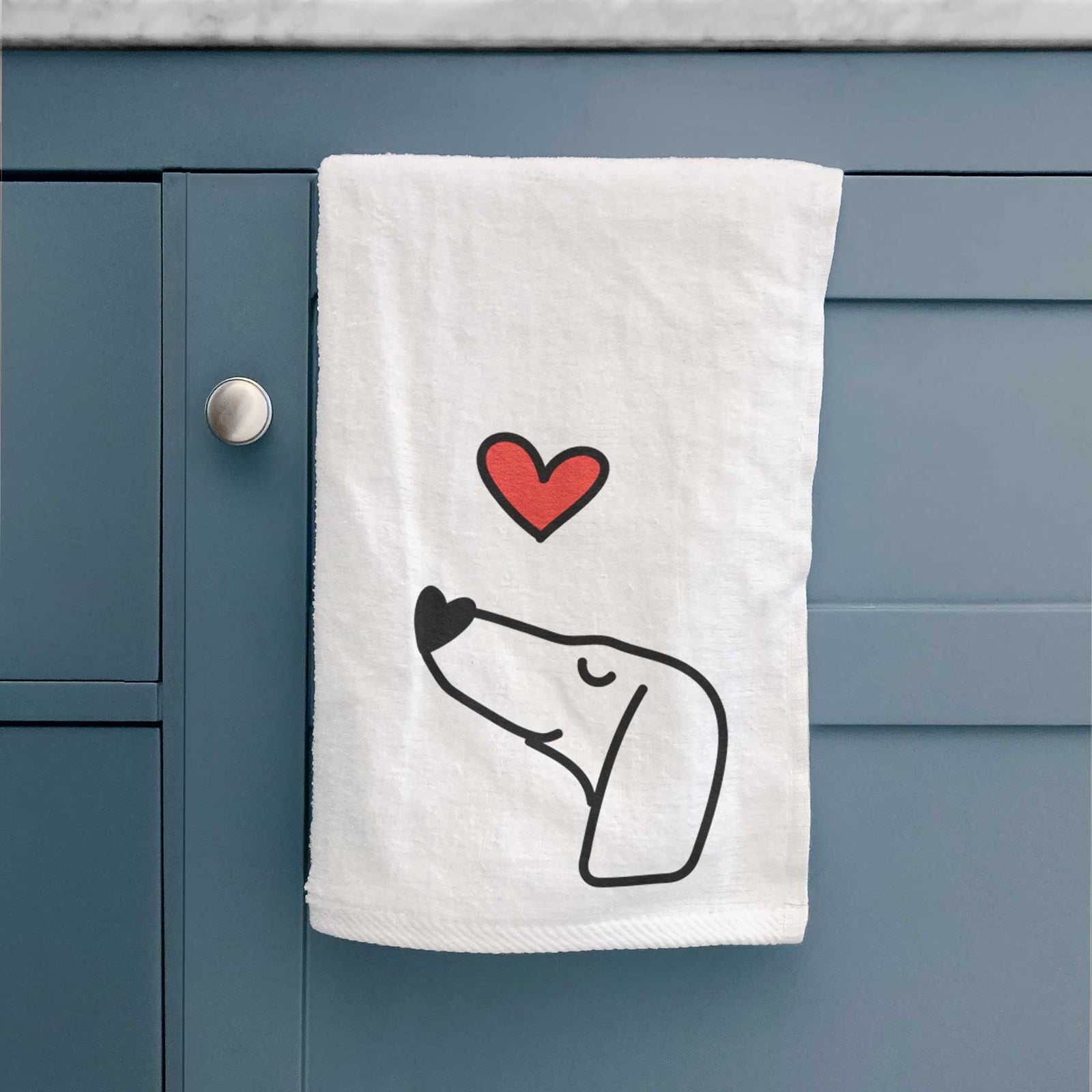 Minimalist line drawing of a Dachshund with a red heart on a decorative hand towel