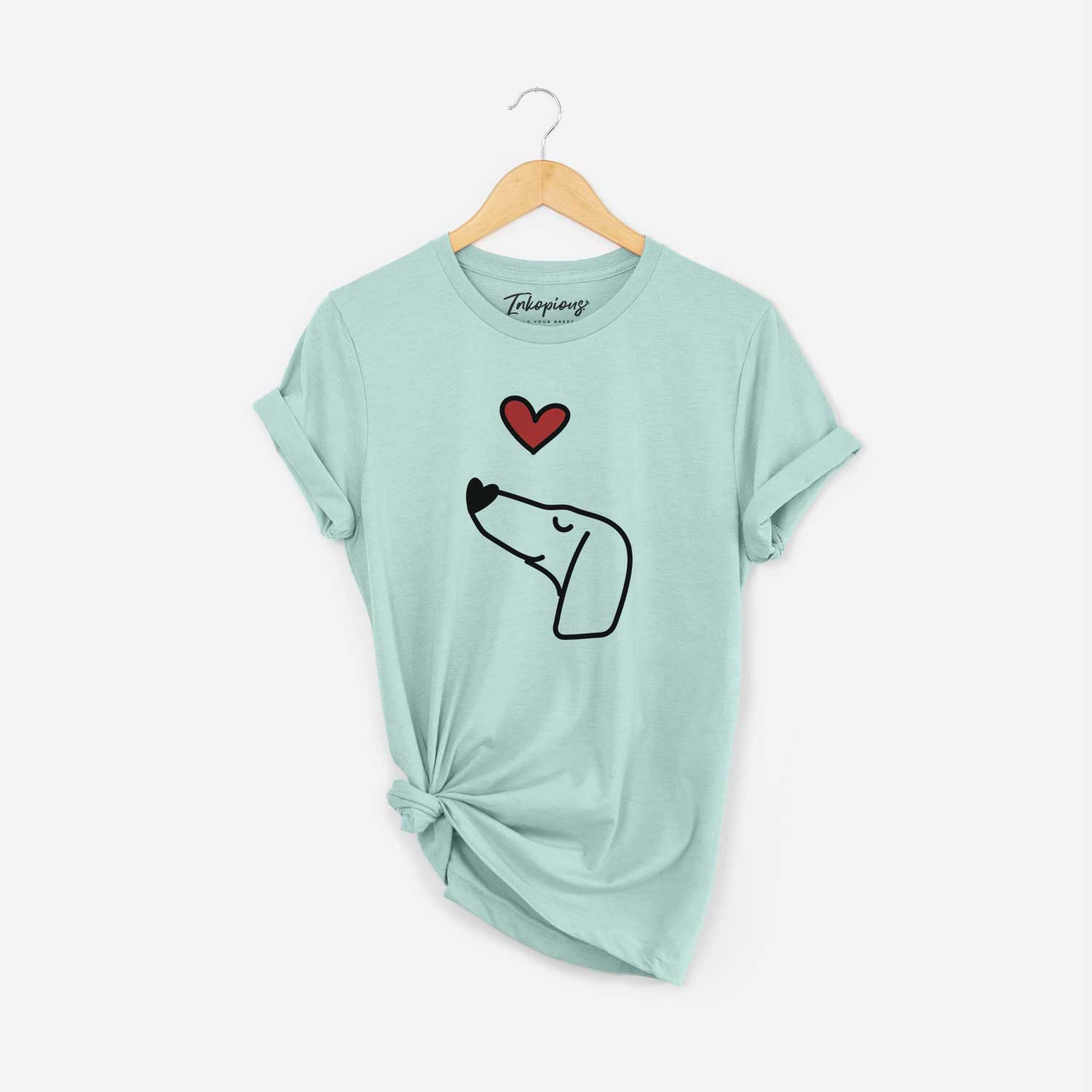 Minimalist line drawing of a Dachshund with a red heart on a Heather Sage Unisex crewneck