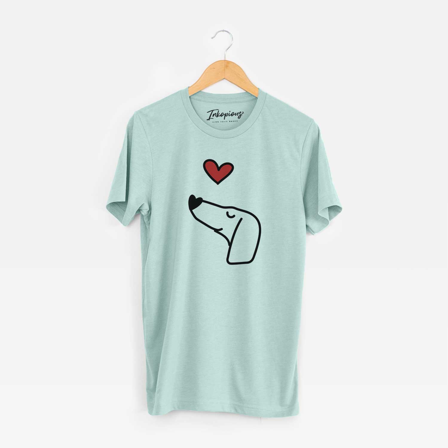 Minimalist line drawing of a Dachshund with a red heart on a Heather Sage Unisex crewneck