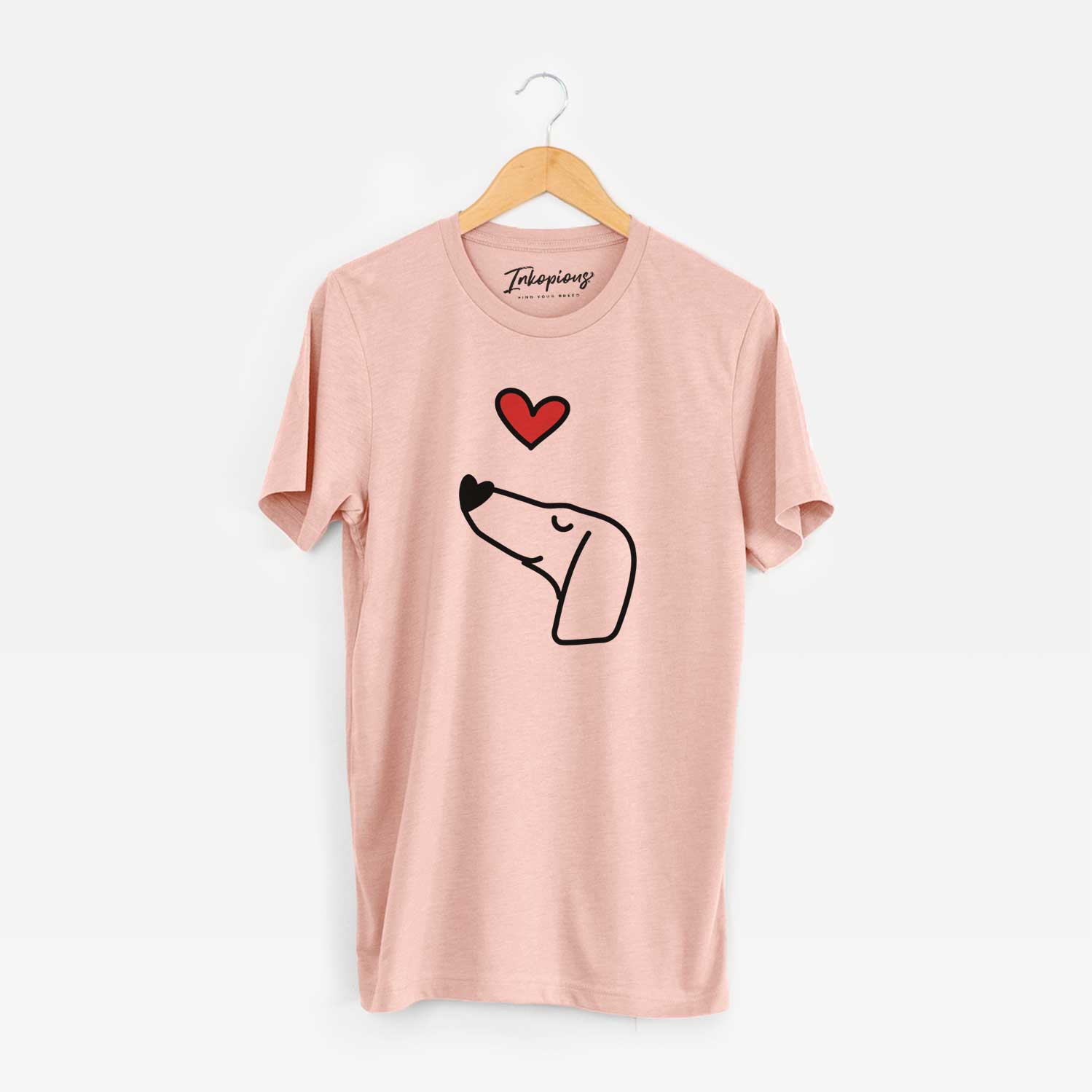 Minimalist line drawing of a Dachshund with a red heart on a Peach Unisex crewneck