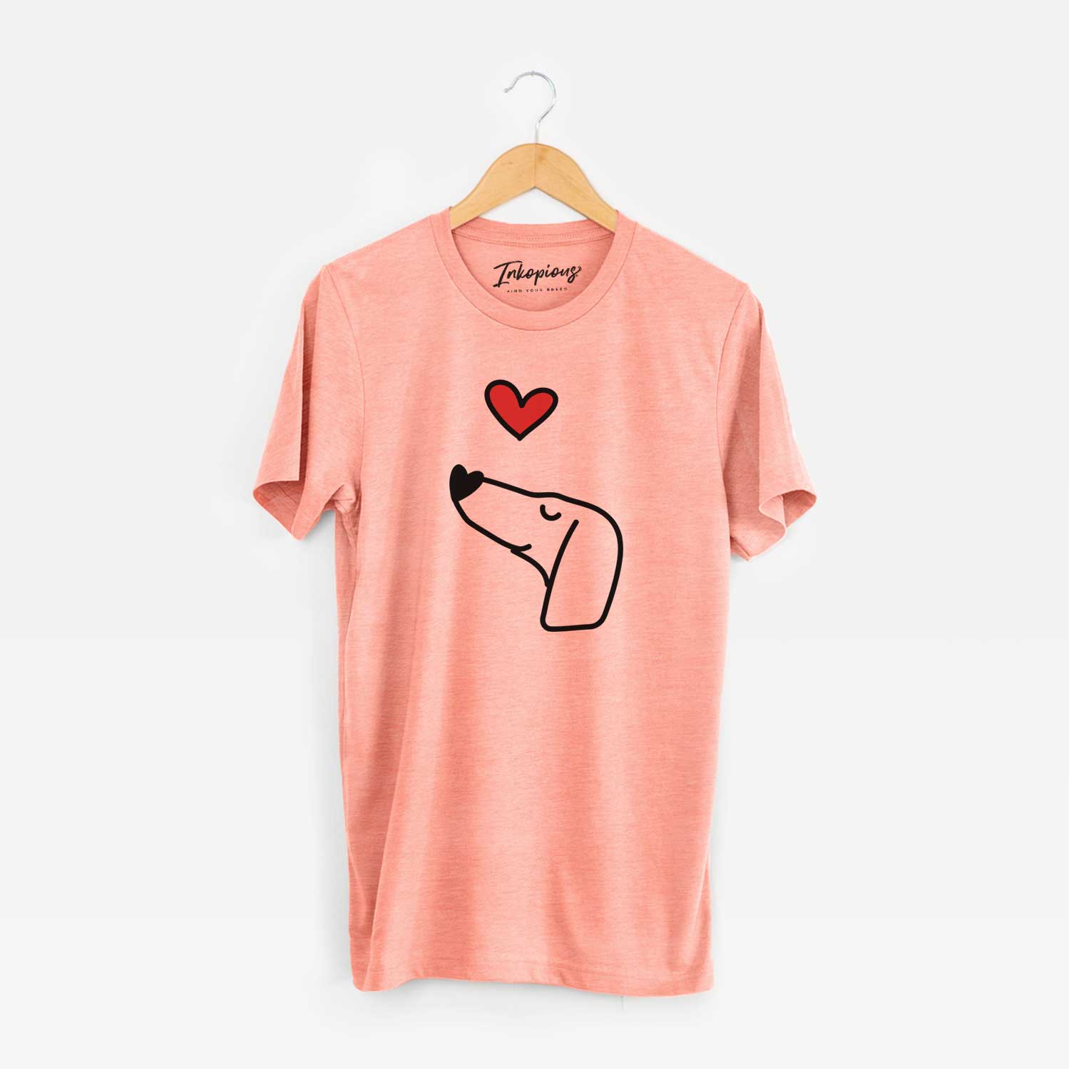Minimalist line drawing of a Dachshund with a red heart on a Sunset Unisex crewneck