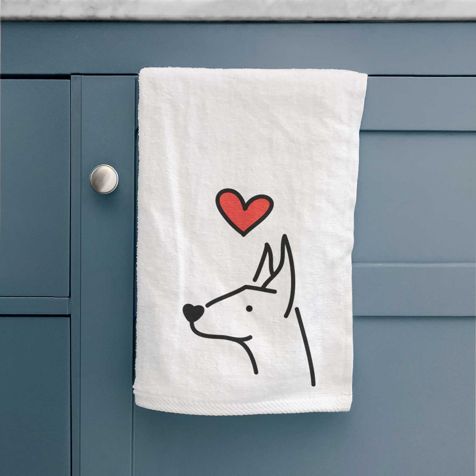 Minimalist line drawing of a Doberman Pinscher with a red heart on a decorative hand towel