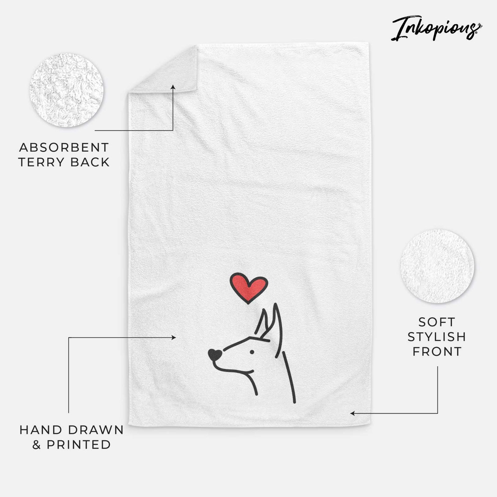 Minimalist line drawing of a Doberman Pinscher with a red heart on a decorative hand towel