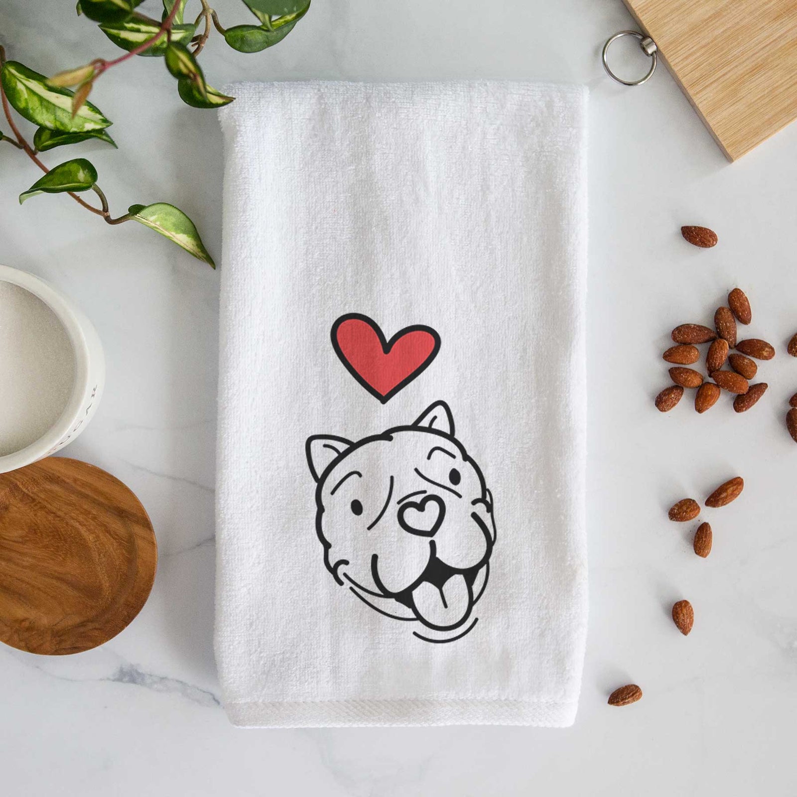 Minimalist line drawing of Draco the American Bulldog with a red heart on a decorative hand towel