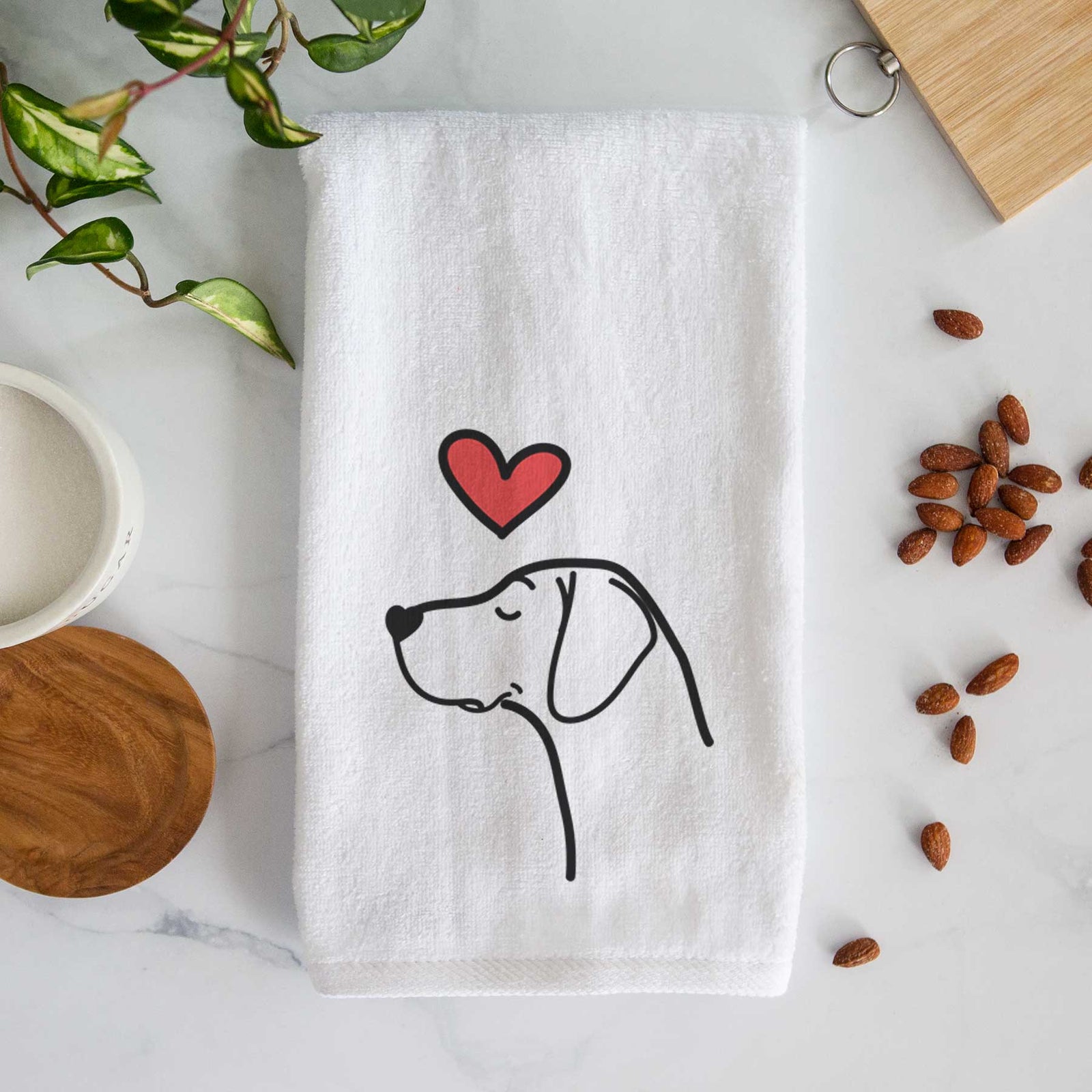 Minimalist line drawing of a German Shorthaired Pointer with a red heart on a decorative hand towel