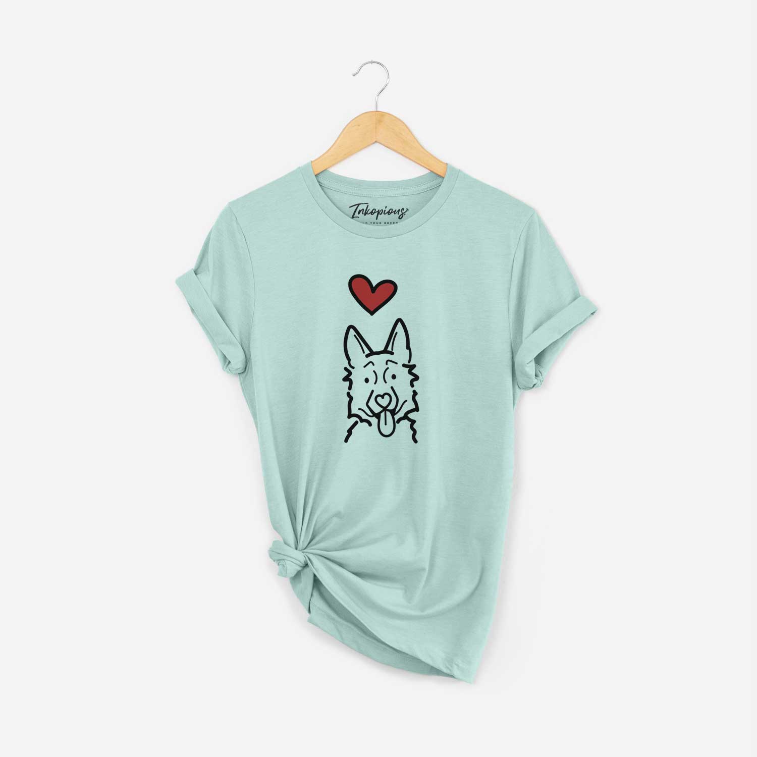 Minimalist line drawing of a German Shepherd with a red heart on a Heather Sage Unisex crewneck