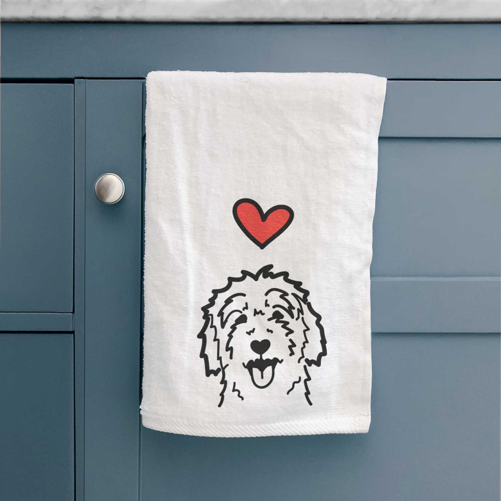 Minimalist line drawing of a Goldendoodle with a red heart on a decorative hand towel