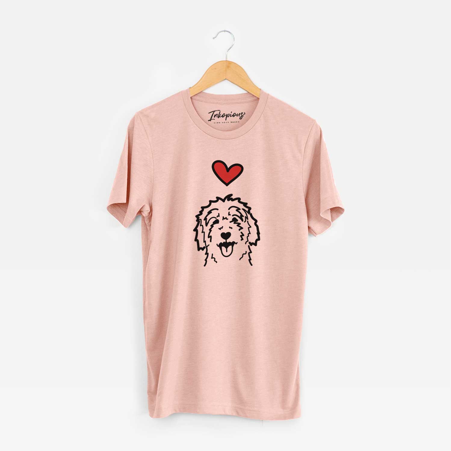 Minimalist line drawing of a Goldendoodle with a red heart on a Peach Unisex crewneck