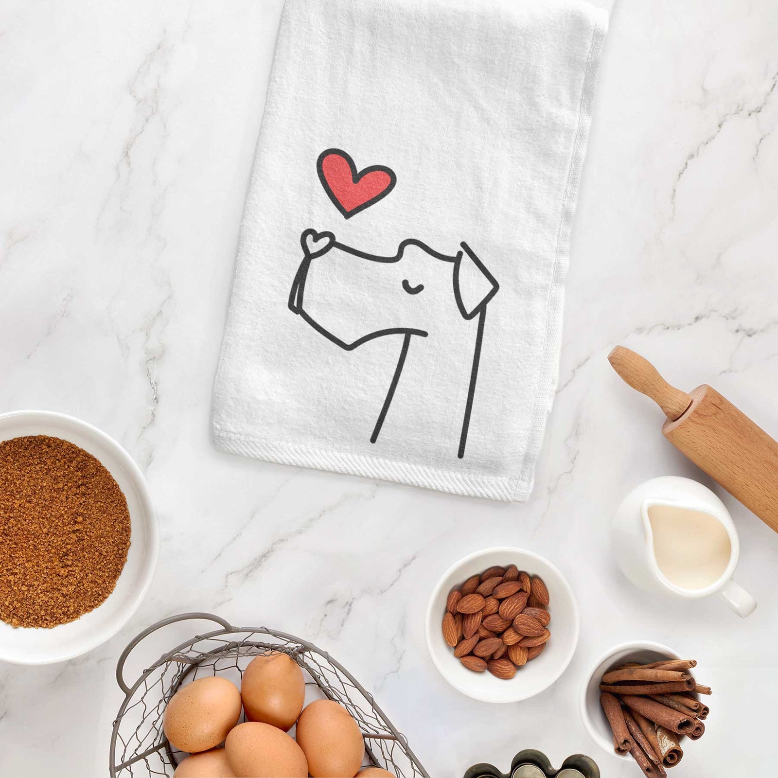 Minimalist line drawing of a Great Dane with a red heart on a decorative hand towel