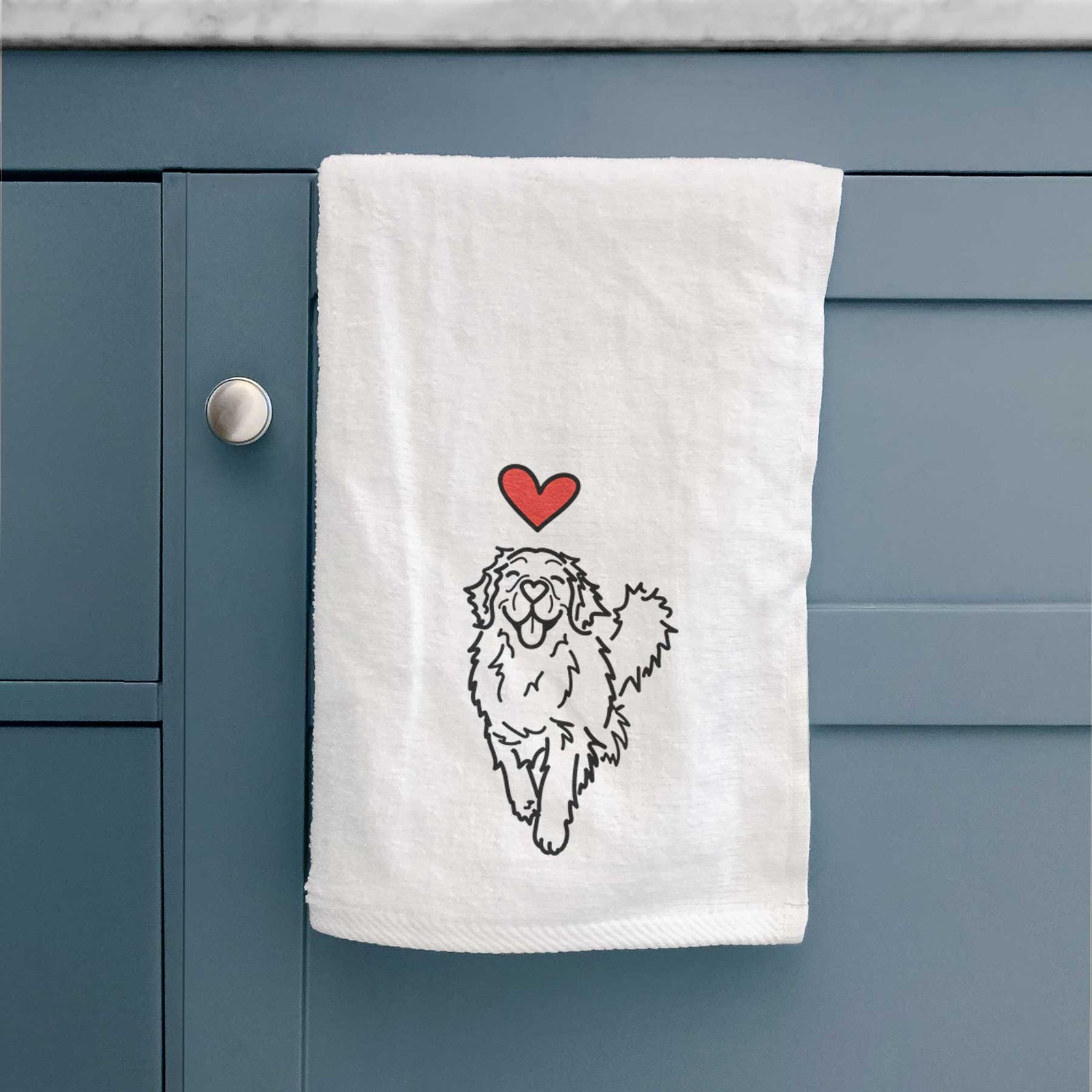 Minimalist line drawing of Hamlet the Golden Retriever with a red heart on a decorative hand towel