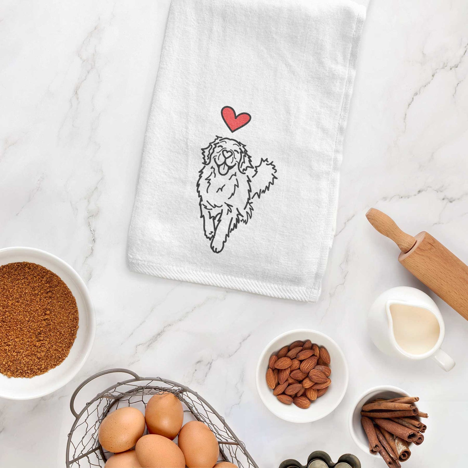 Minimalist line drawing of Hamlet the Golden Retriever with a red heart on a decorative hand towel