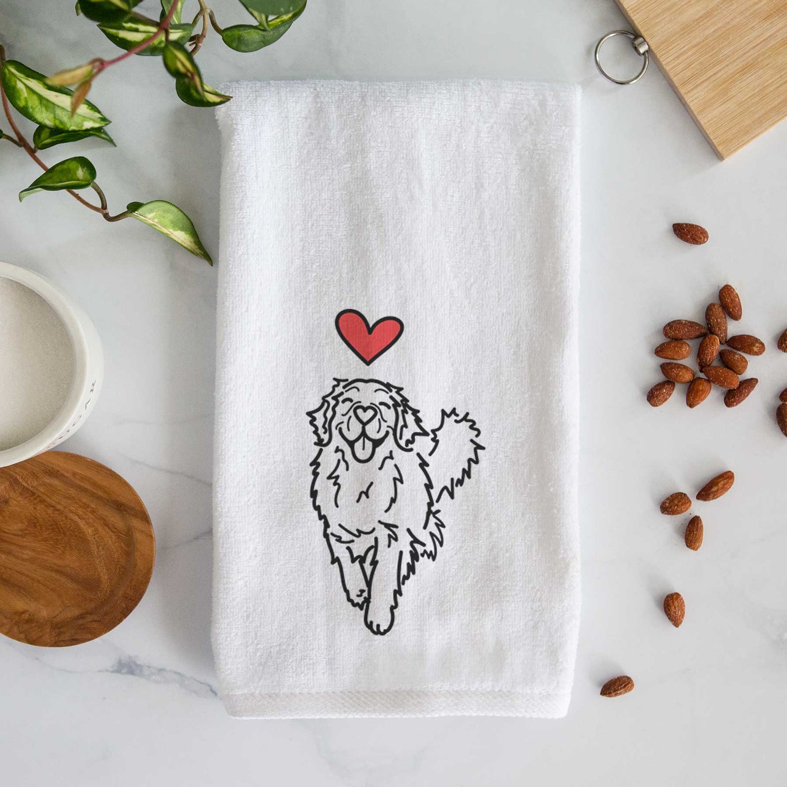 Minimalist line drawing of Hamlet the Golden Retriever with a red heart on a decorative hand towel