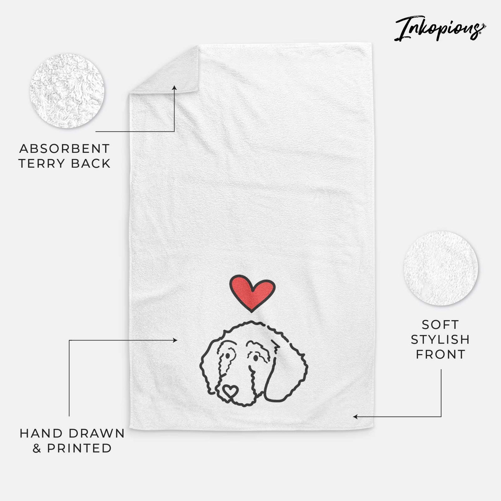 Minimalist line drawing of Hanna the Goldendoodle with a red heart on a decorative hand towel