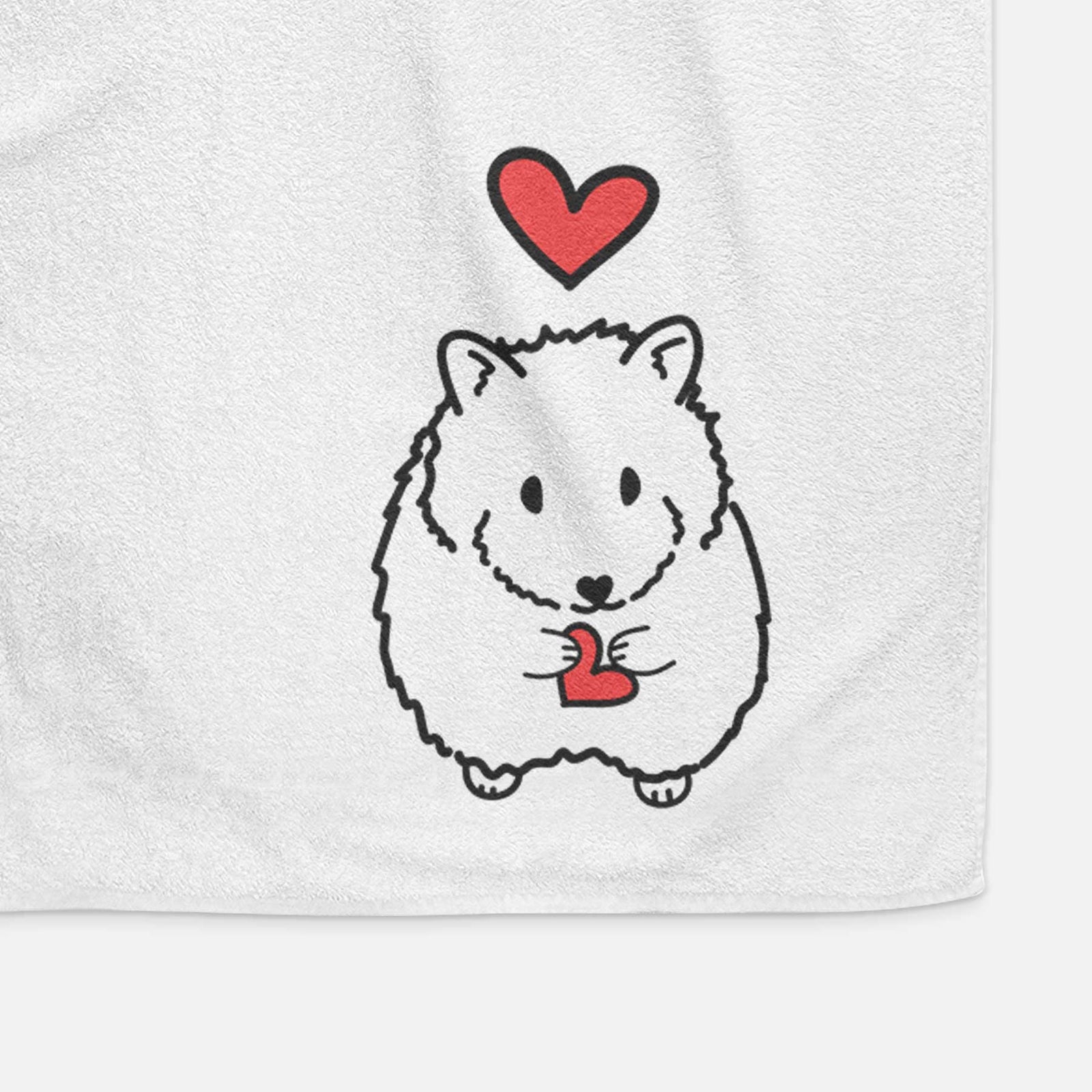 Minimalist line drawing of Hilga the Hamster with a red heart on a decorative hand towel
