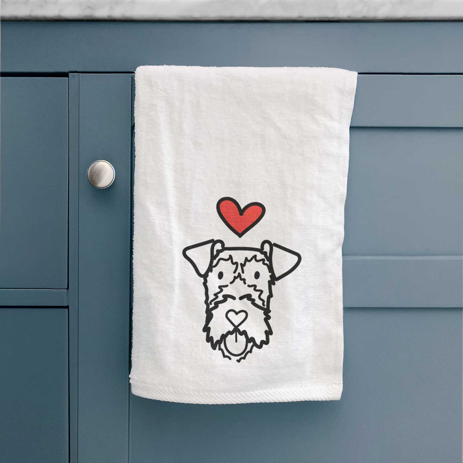 Minimalist line drawing of an Irish Terrier with a red heart on a decorative hand towel